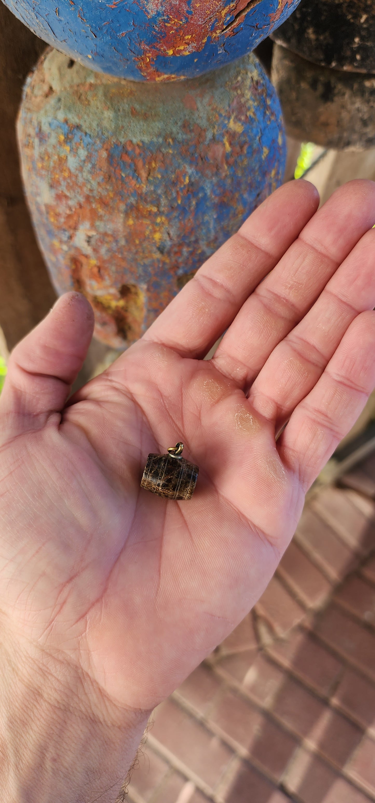 This little beauty may be small, but it holds a whole world of history in its agate heart. Meet your Antique Victorian Era Carved Brown Agate Fob Pendant—a mysterious relic straight out of the 1800s.