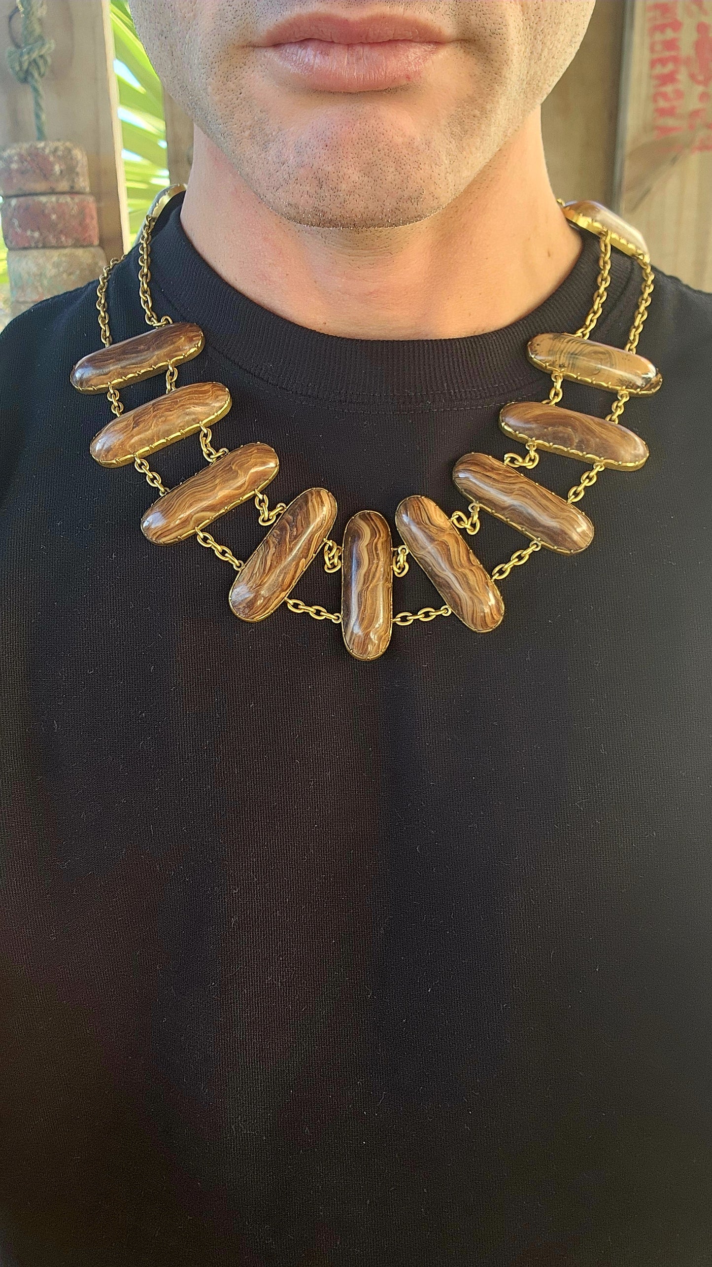 This statement necklace is an absolute marvel of Victorian grandeur and geological splendor. A rare and arresting collar necklace dating to the early to mid-19th century.