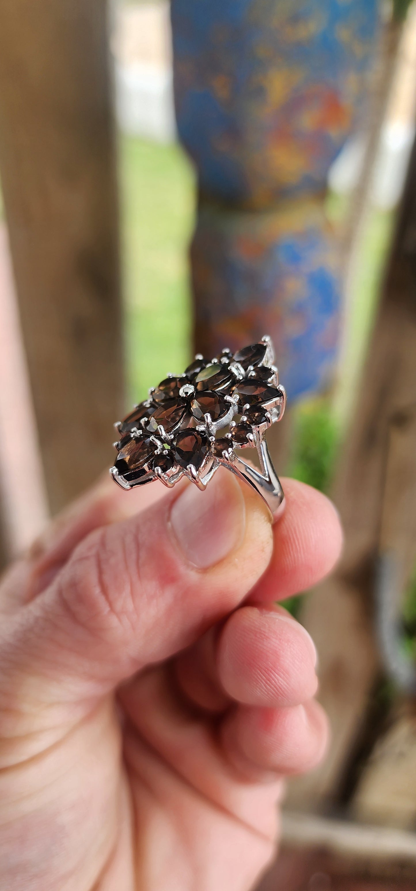 Dramatic, decadent, and unapologetically bold statement ring!Crafted in cool sterling silver and finished with a luxe rhodium plating to keep its brilliance blazing, this dazzling floral-inspired piece explodes like a earthy firework in full bloom.
