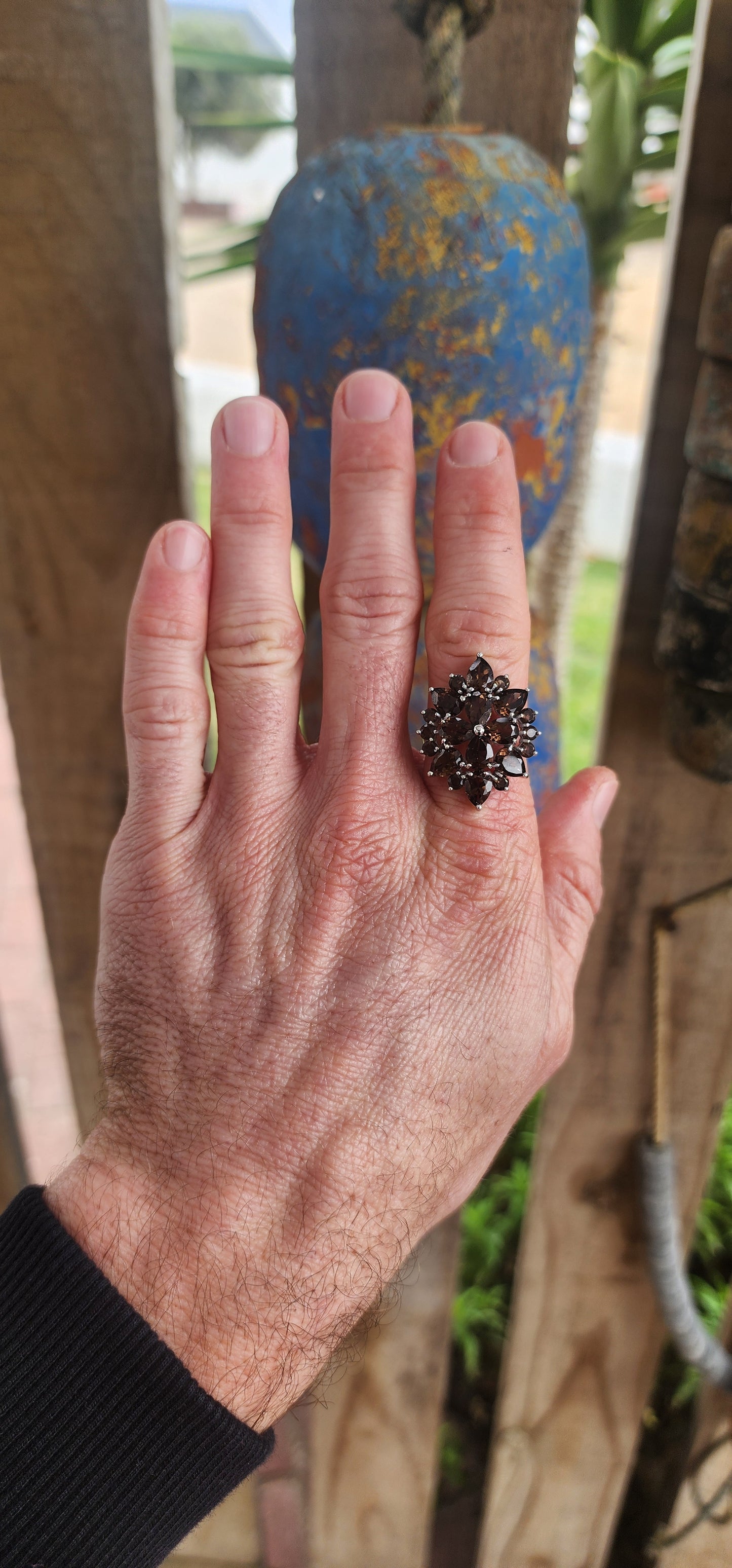 Dramatic, decadent, and unapologetically bold statement ring!Crafted in cool sterling silver and finished with a luxe rhodium plating to keep its brilliance blazing, this dazzling floral-inspired piece explodes like a earthy firework in full bloom.