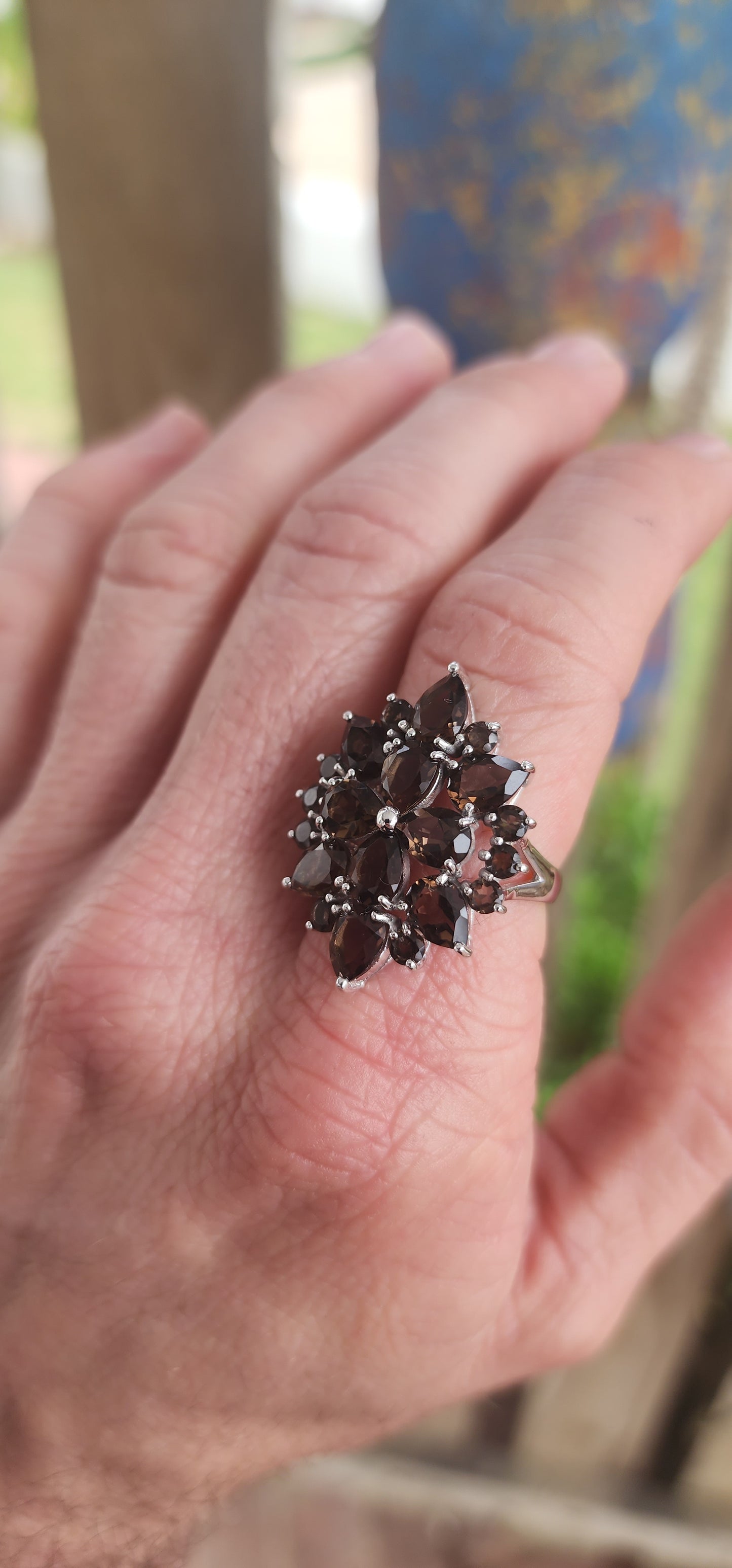 Dramatic, decadent, and unapologetically bold statement ring!Crafted in cool sterling silver and finished with a luxe rhodium plating to keep its brilliance blazing, this dazzling floral-inspired piece explodes like a earthy firework in full bloom.