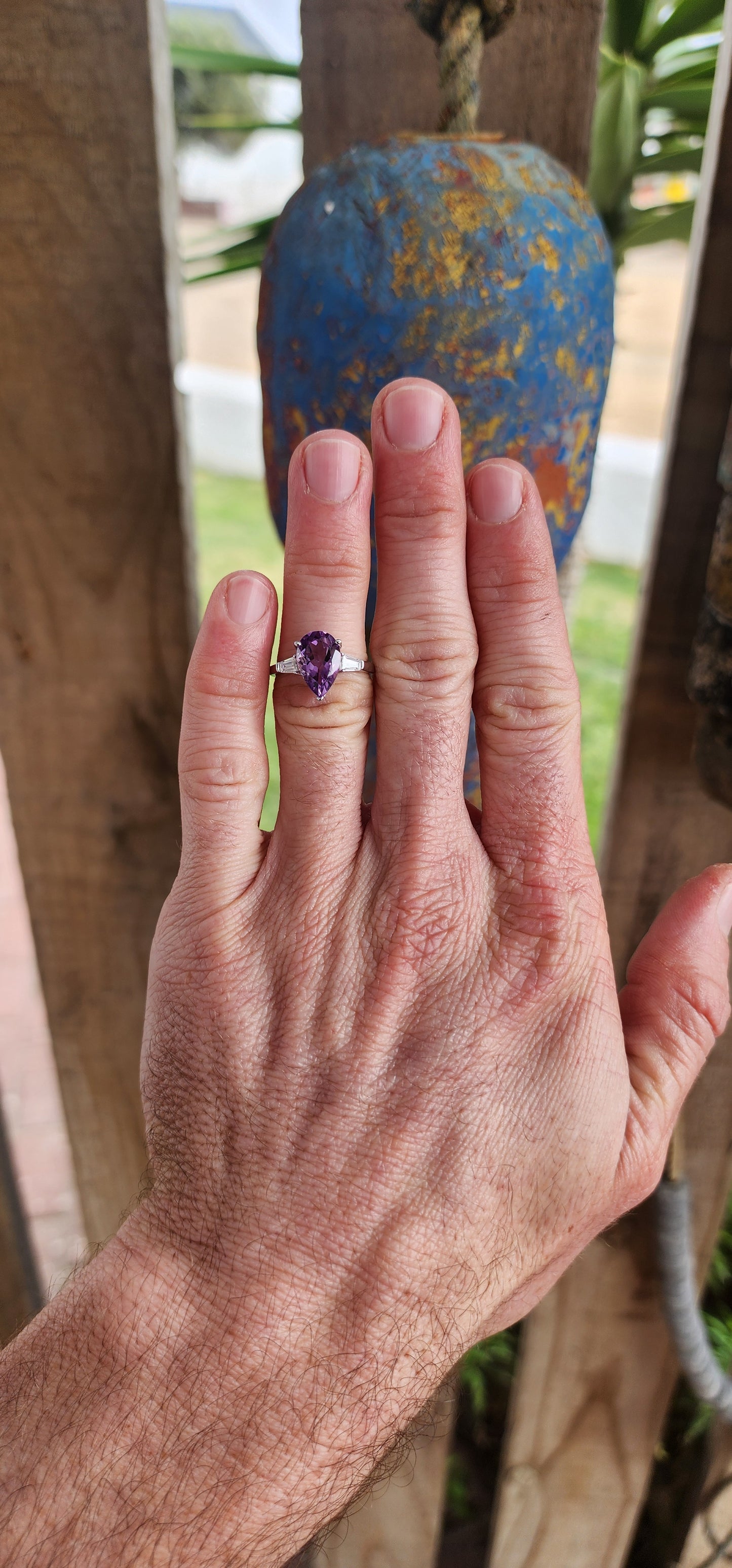 Prepare to be enchanted — this sterling silver trilogy ring is pure majesty wrapped in violet fire and classic elegance!