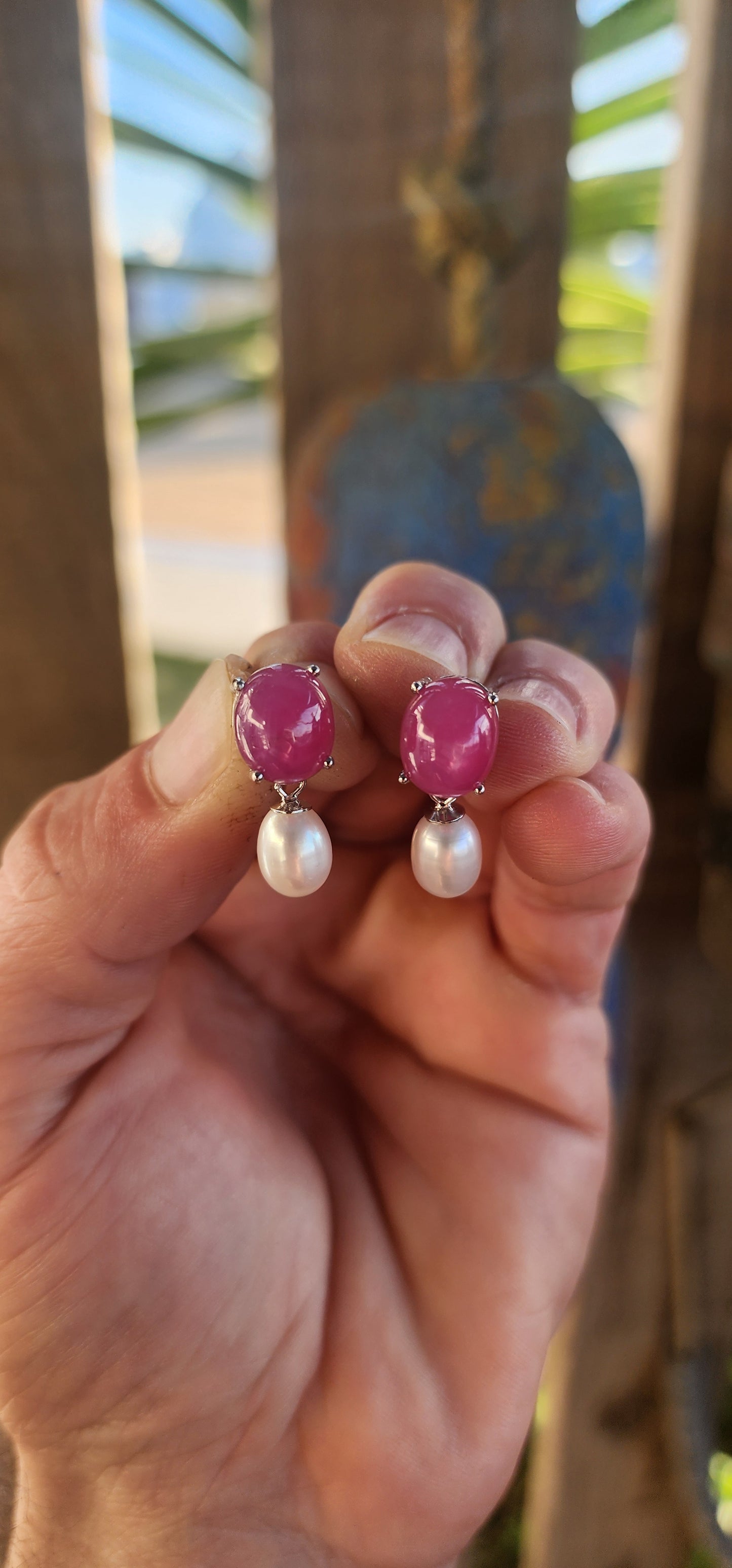 Dramatic yet delicate, these earrings are like love letters from two different worlds—where the fiery charm of rubies meets the soft whisper of pearls in perfect harmony.