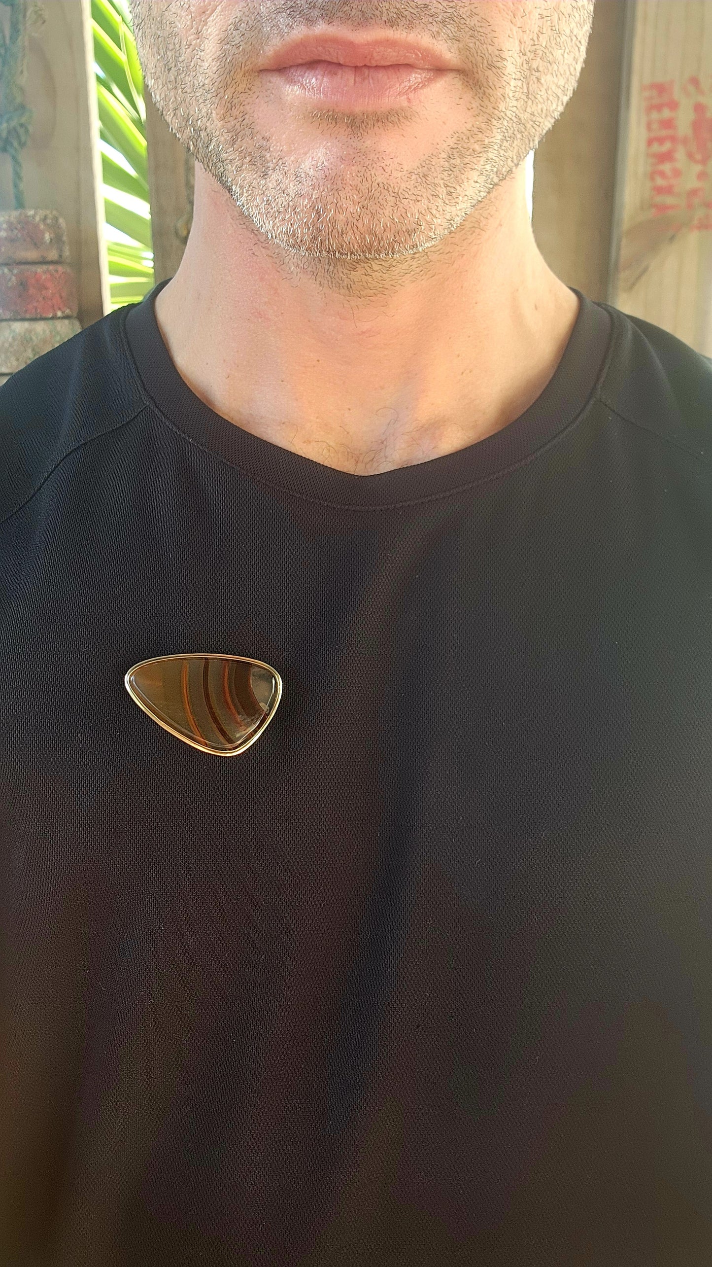 A bold beauty from the modernist 1970s, this vintage brooch is a wearable ode to Earth’s ancient artistry and retro design flair.