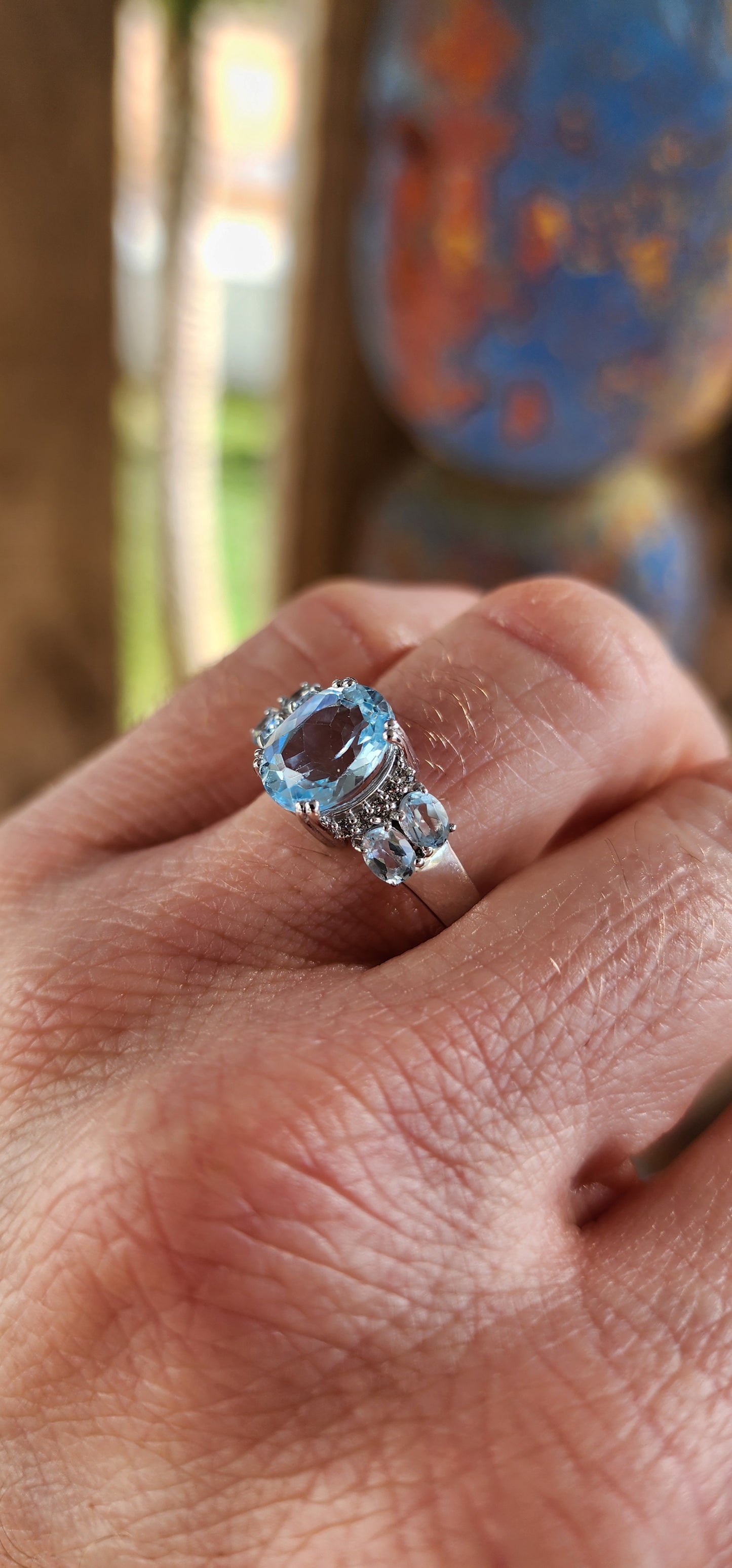 "Cloudlight Crown" – A Ring of Sky and Sparkle
Like a breath of fresh air in jewelry form, this marvelous, rather chunky trilogy-style ring is expertly crafted in rhodium-plated sterling silver, ensuring it keeps its high-polish shine.