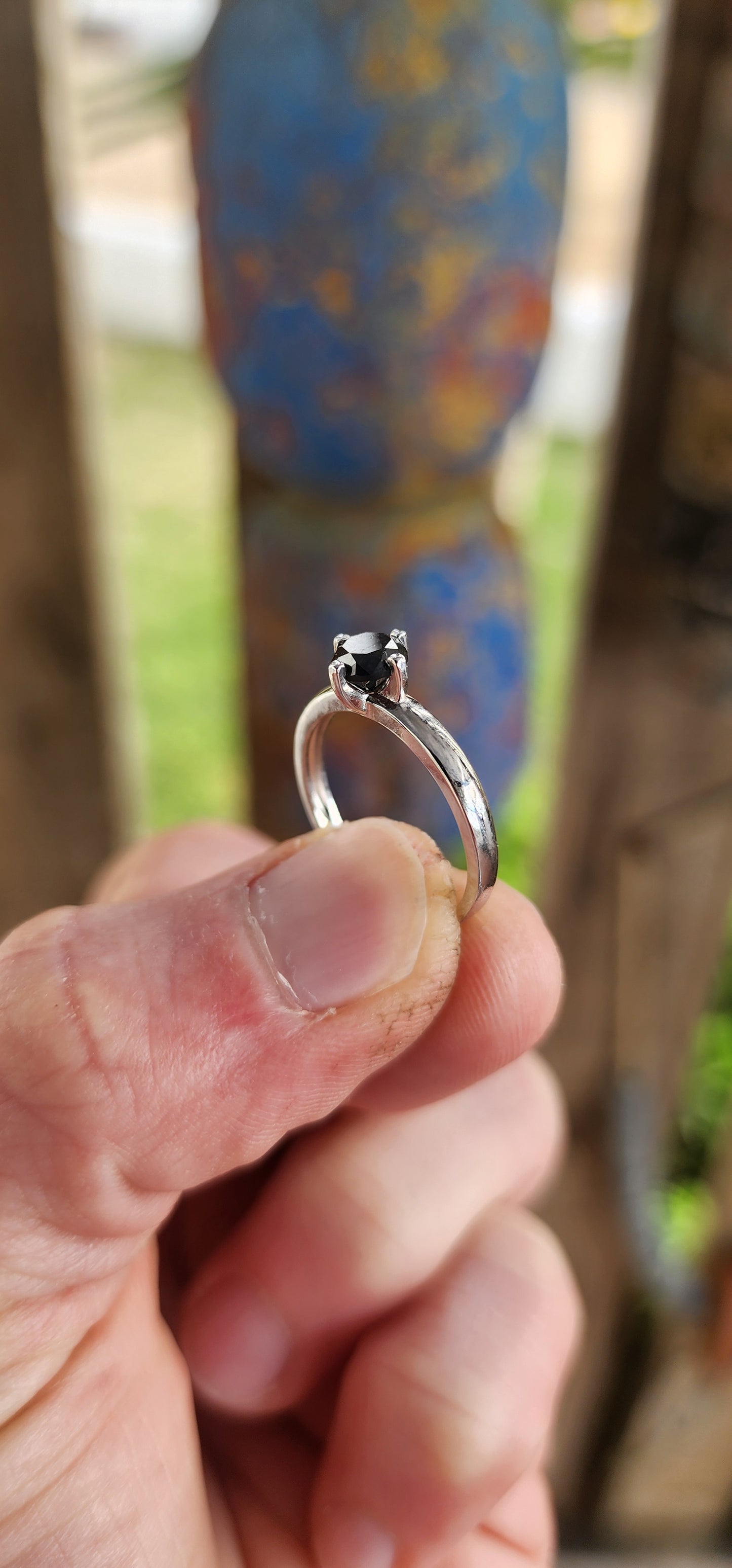 Elegant in its simplicity yet powerful in its presence, this sterling silver solitaire ring is a timeless embodiment of understated luxury.