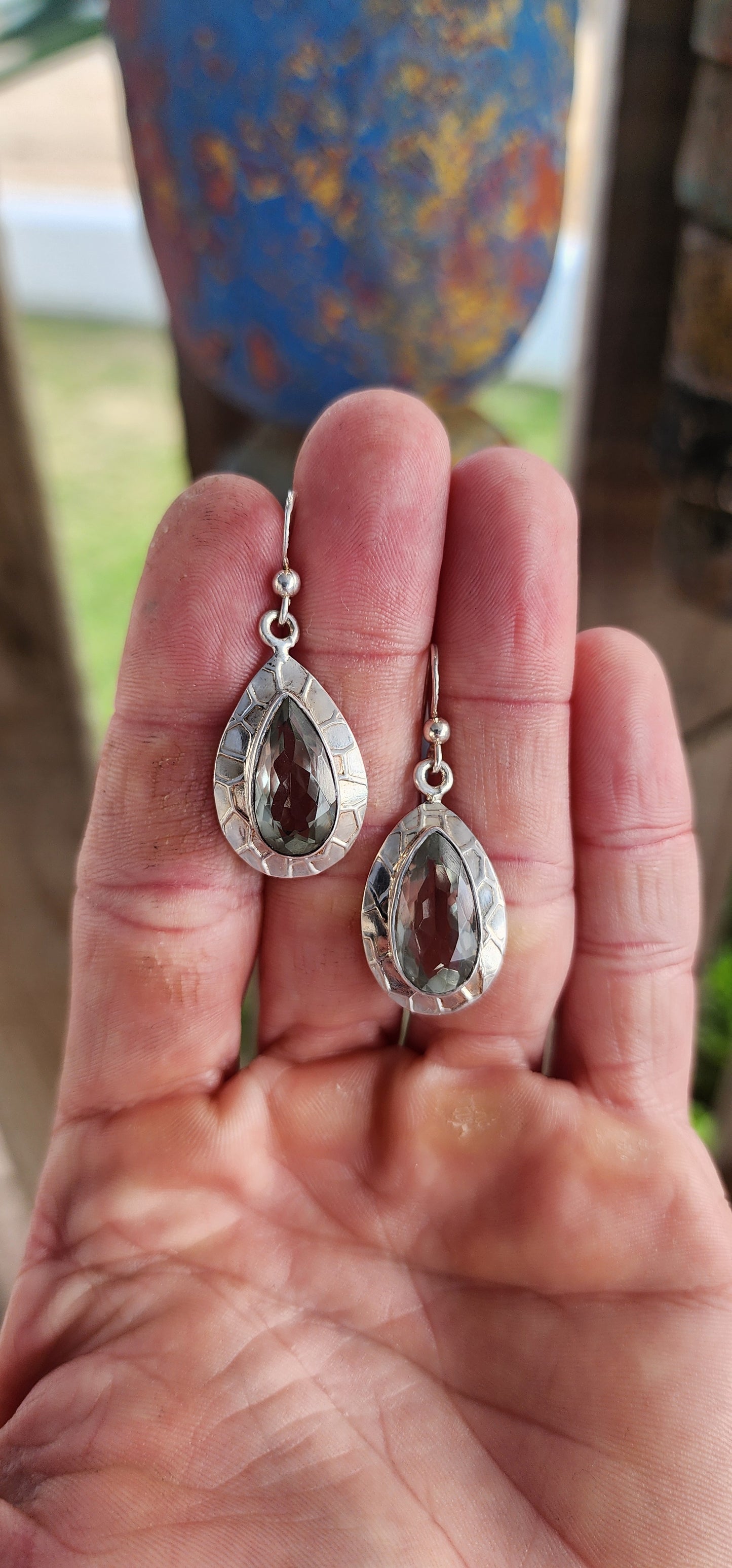 These artisan-crafted drop earrings are like little treasures from a jungle fairytale—bold, beautiful, and utterly untamed.