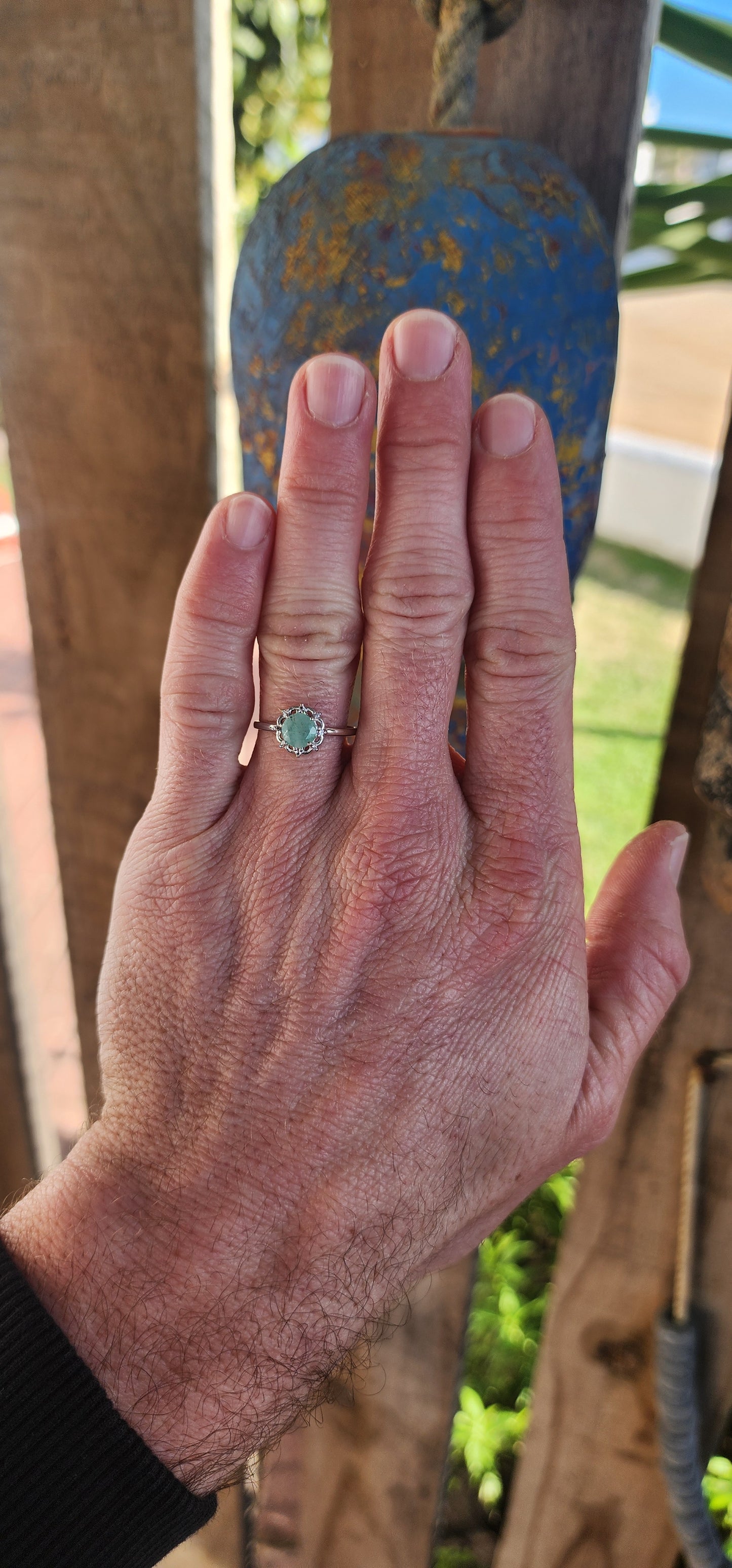 Delicate, graceful, and utterly enchanting — this ring is a dainty drop of nature's magic. Crafted in luminous sterling silver and finished with a sleek rhodium plating, the slender band draws your gaze directly to the star of the show!