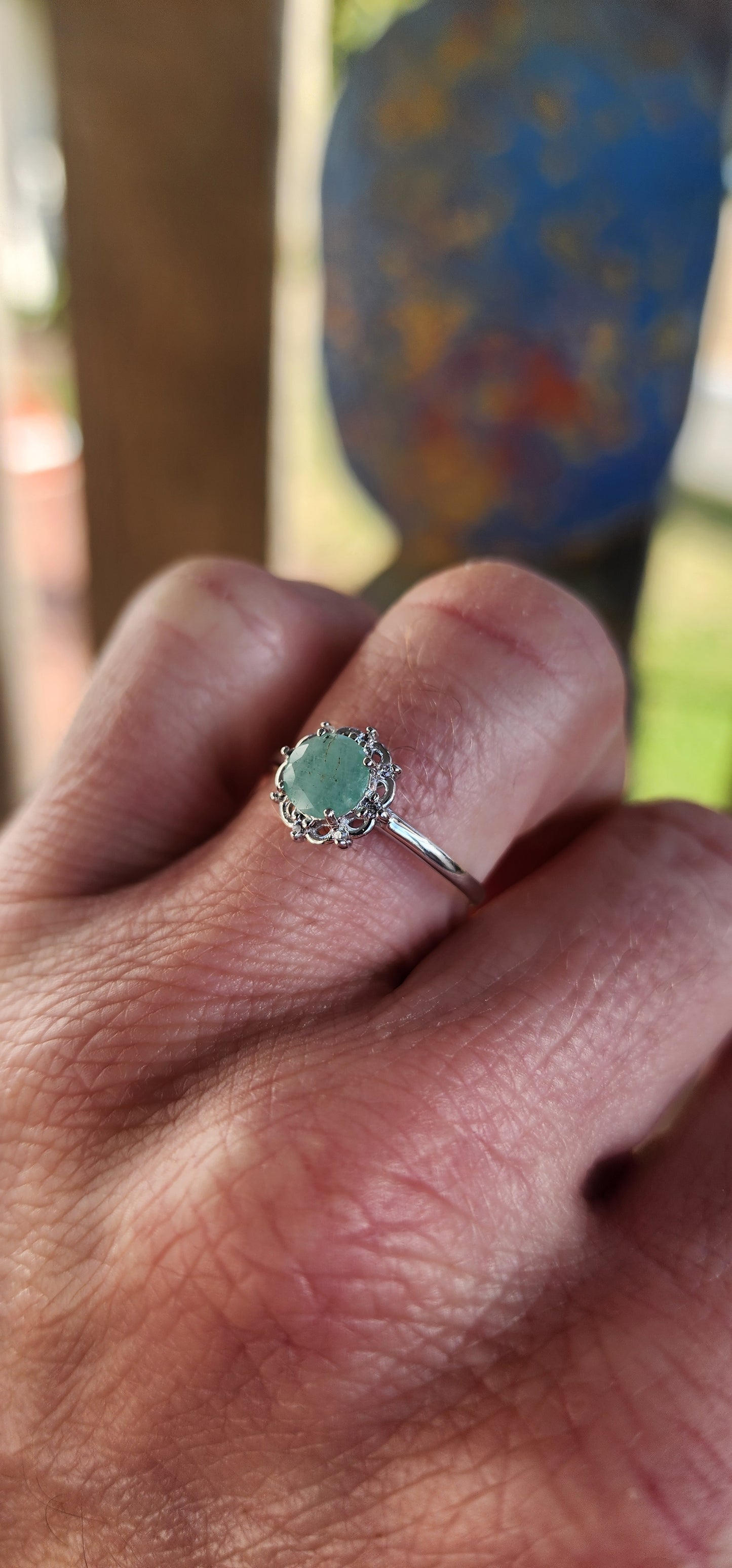 Delicate, graceful, and utterly enchanting — this ring is a dainty drop of nature's magic. Crafted in luminous sterling silver and finished with a sleek rhodium plating, the slender band draws your gaze directly to the star of the show!
