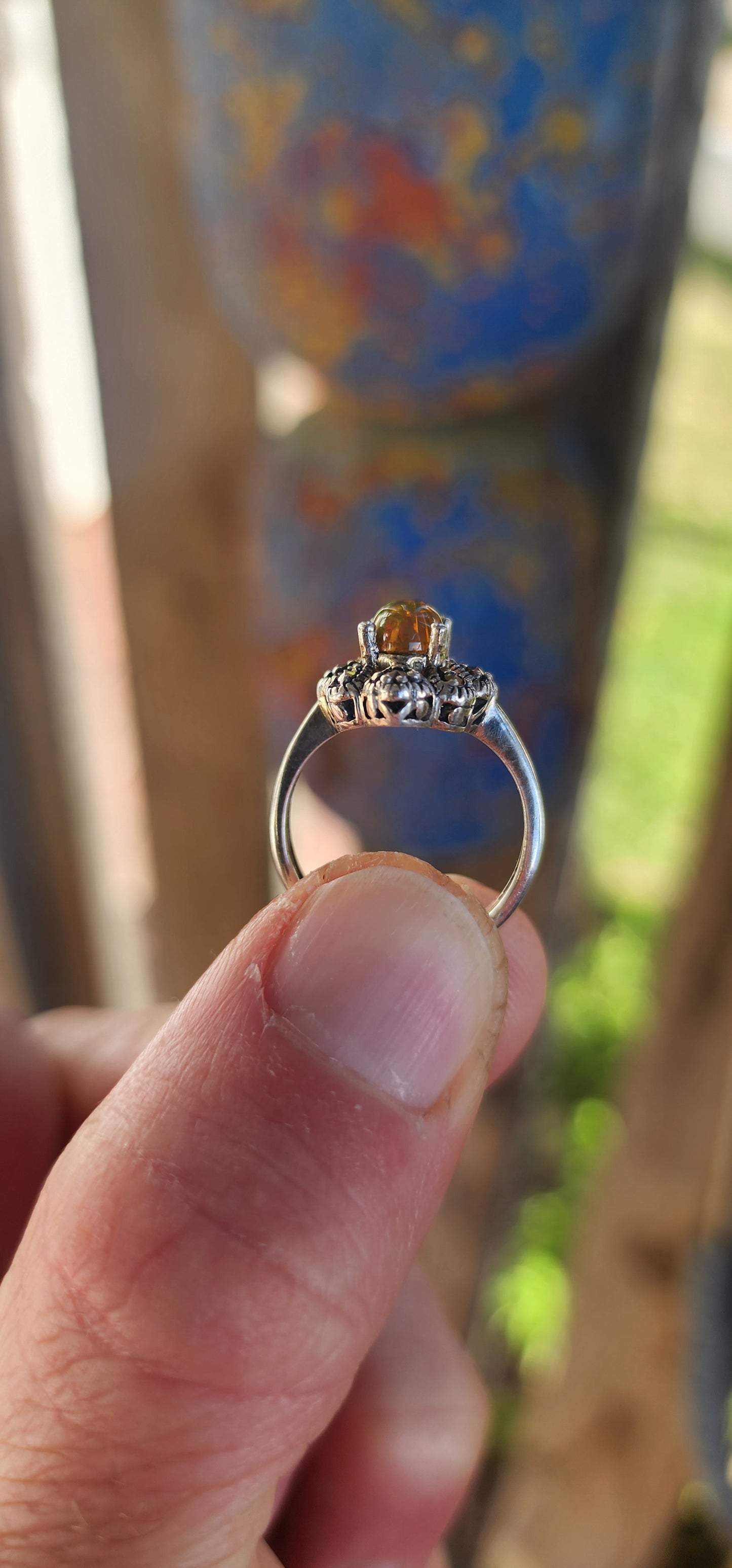 This vintage-inspired beauty is like a whispered love letter from another era, where craftsmanship was poetry and gemstones carried stories. Cast in glowing sterling silver, the ring gently cradles an exquisite oval Ethiopian opal cabochon.
