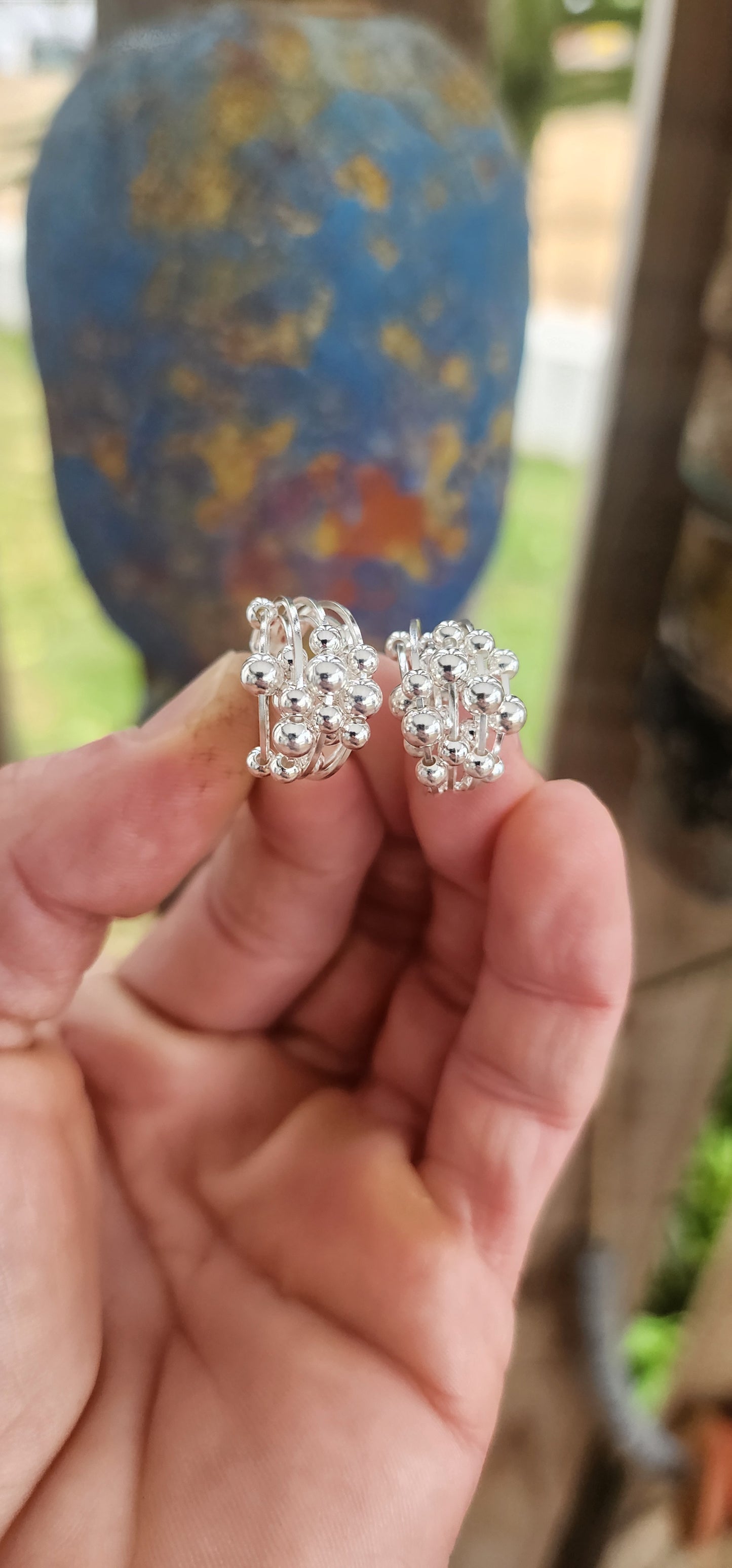 "Bubbles in Motion" - Articulated Sterling Silver Hoop Earrings.