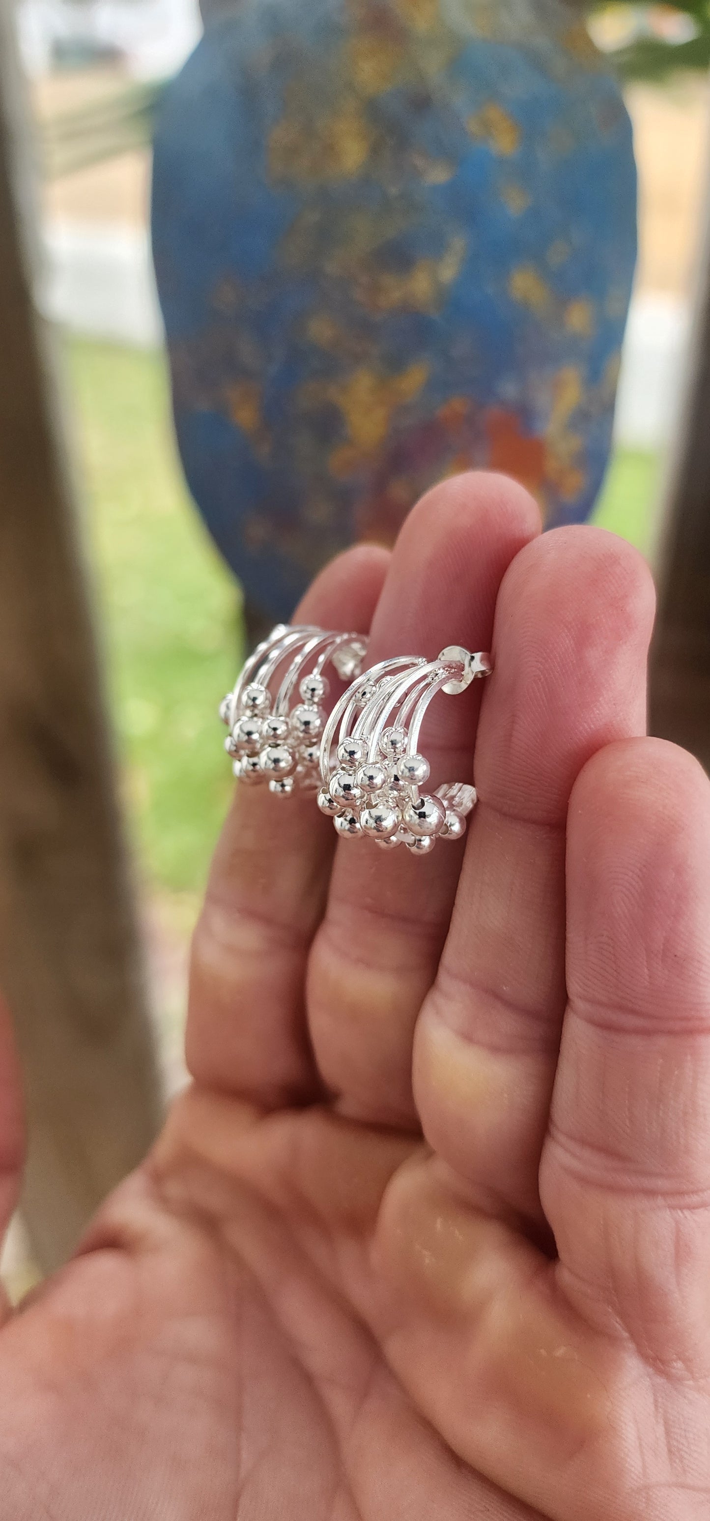 "Bubbles in Motion" - Articulated Sterling Silver Hoop Earrings.