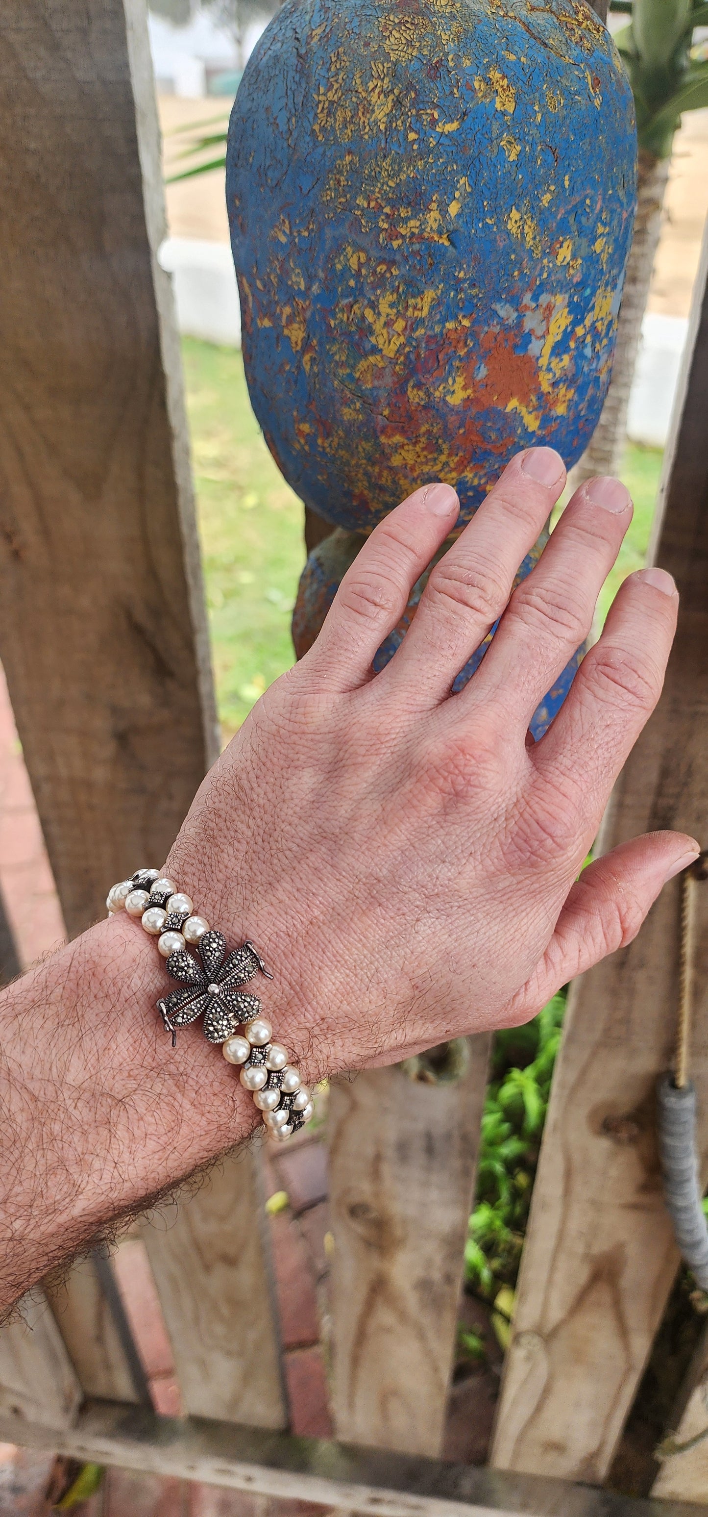 "Pearls & Petals: A Deco Daydream"This enchanting bracelet is crafted in a vintage Art Deco style — capturing the glamour of the 1920s while being a contemporary creation that channels all the charm of yesteryear.
