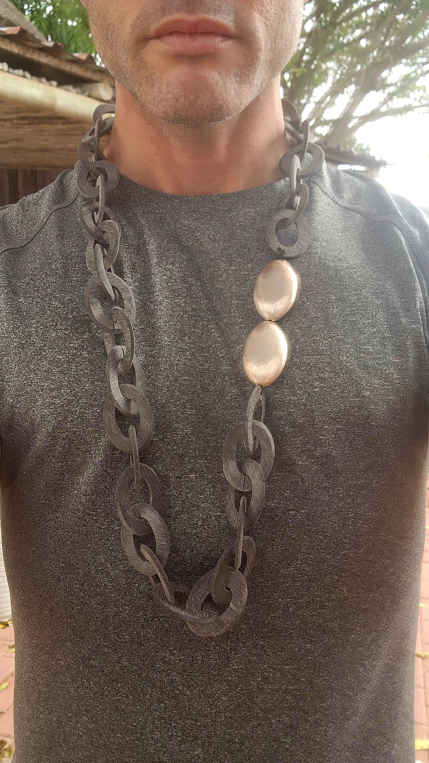 Summon your inner tribal warrior with this dramatic statement necklace carved from rich black buffalo horn.