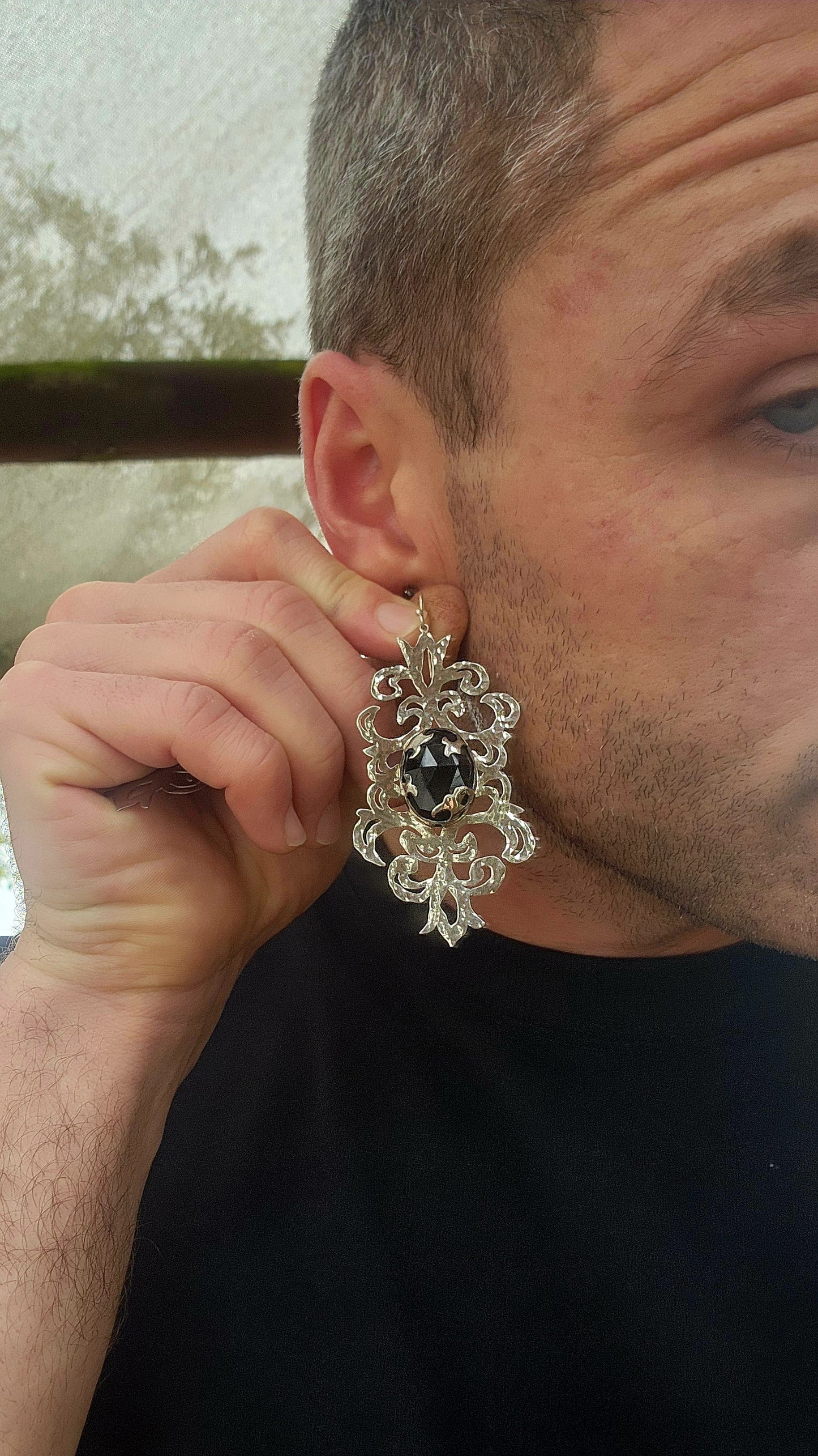 Absolutely striking and unapologetically bold — these statement earrings are a celebration of intricate craftsmanship and gothic elegance, brought to life by the acclaimed South African jewelry brand Topiary and Ashe.