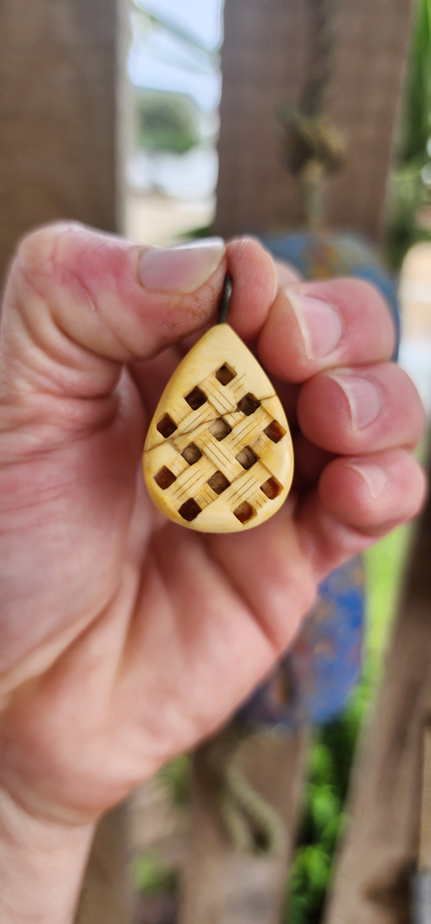 This early Victorian-era treasure is an antique pre-ban hand-carved ivory perfume/pomander amulet pendant, likely of Arabic origin.