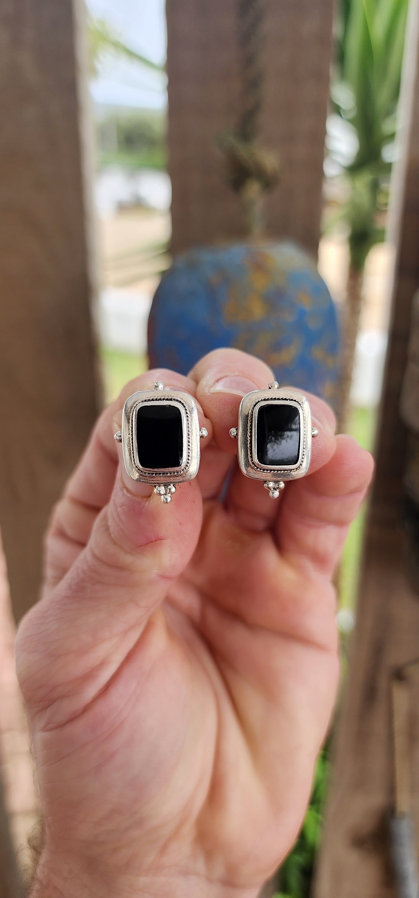 Timeless with a bold, tailored edge, this vintage pair of sterling silver push-in earrings is a striking example of balance between structure and mystique.