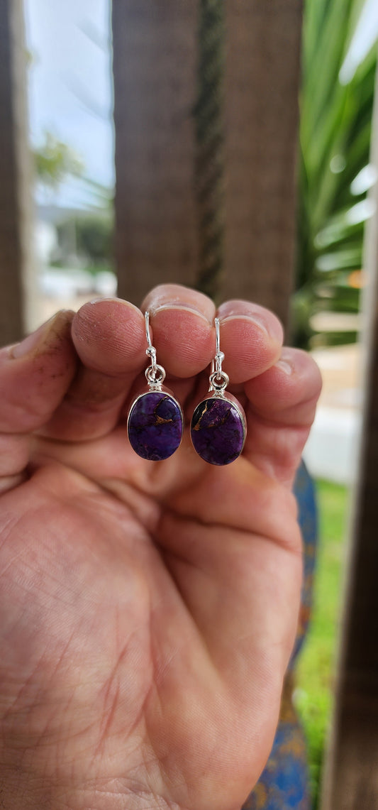 Minimalist? Yes. But boring? Never! These sterling silver dangle earrings are the definition of small but mighty magical.