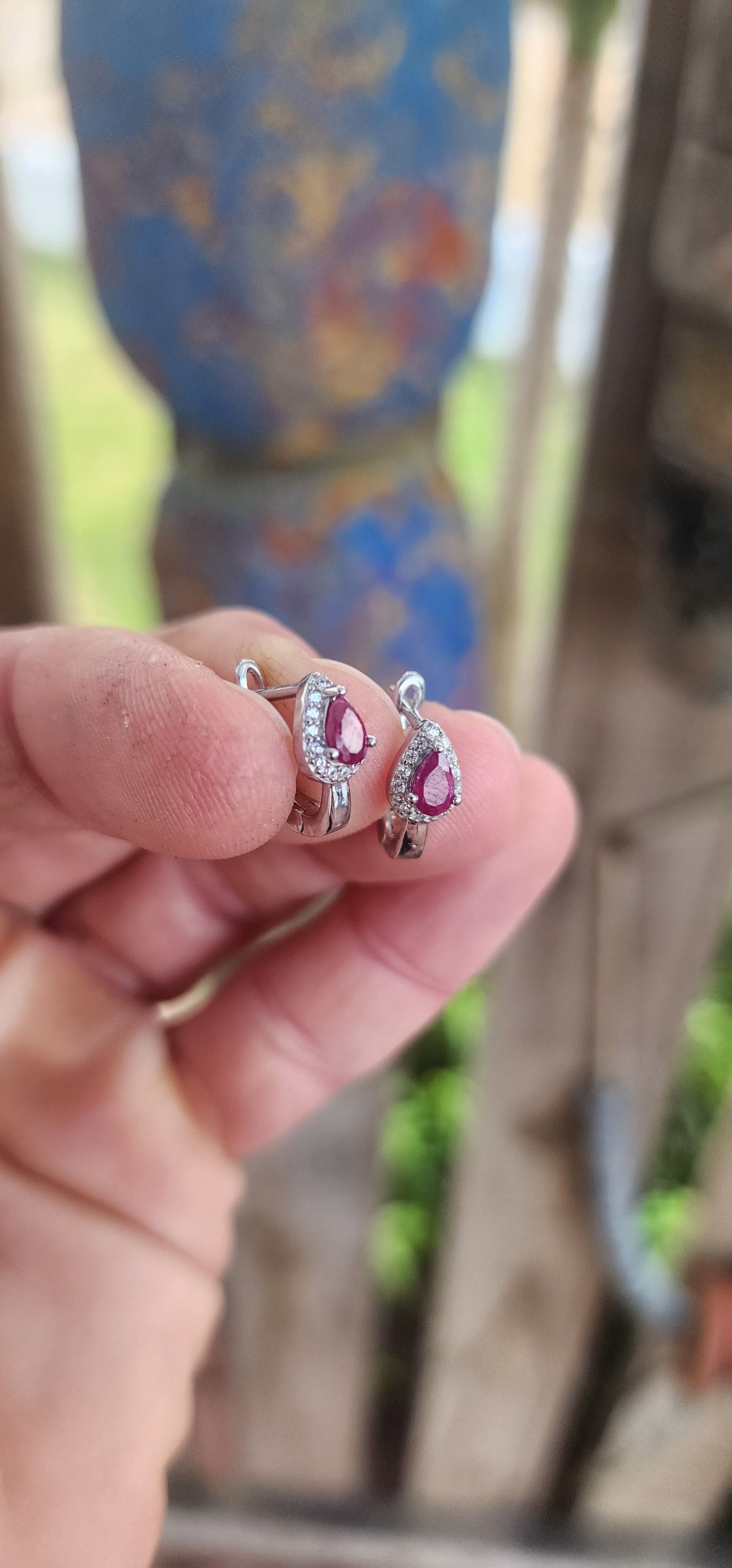 Delicately crafted in glowing sterling silver, these earrings embody sophistication in a compact yet captivating design.