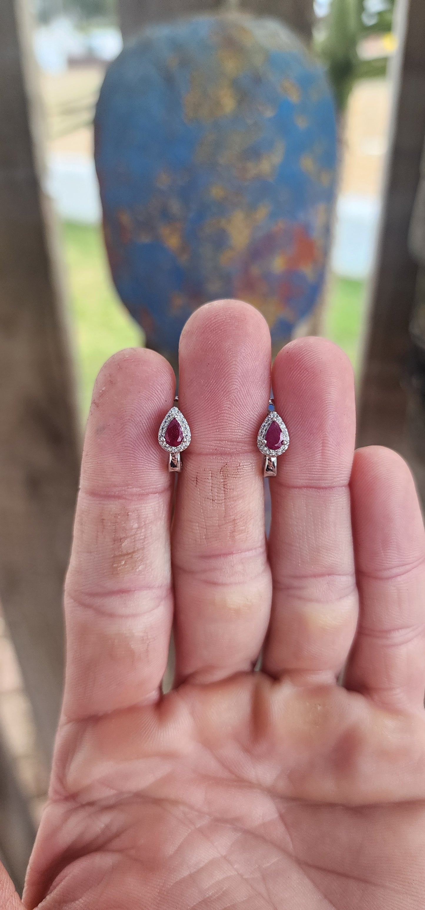 Delicately crafted in glowing sterling silver, these earrings embody sophistication in a compact yet captivating design.