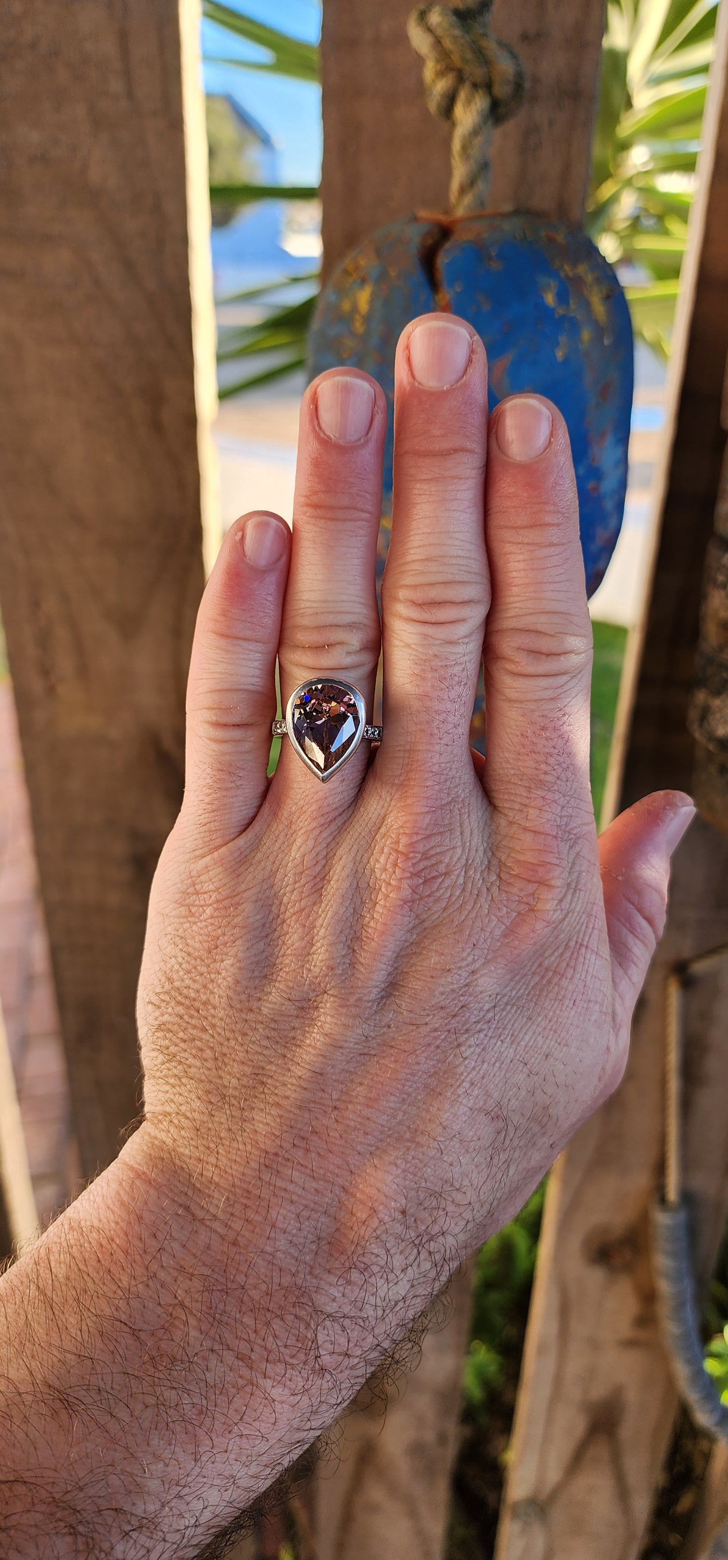 Blast off in style with this chunky sterling silver statement ring! Crafted from solid sterling silver, this bold beauty shows off a mouthwatering and large sized, pear-shaped pink CZ.