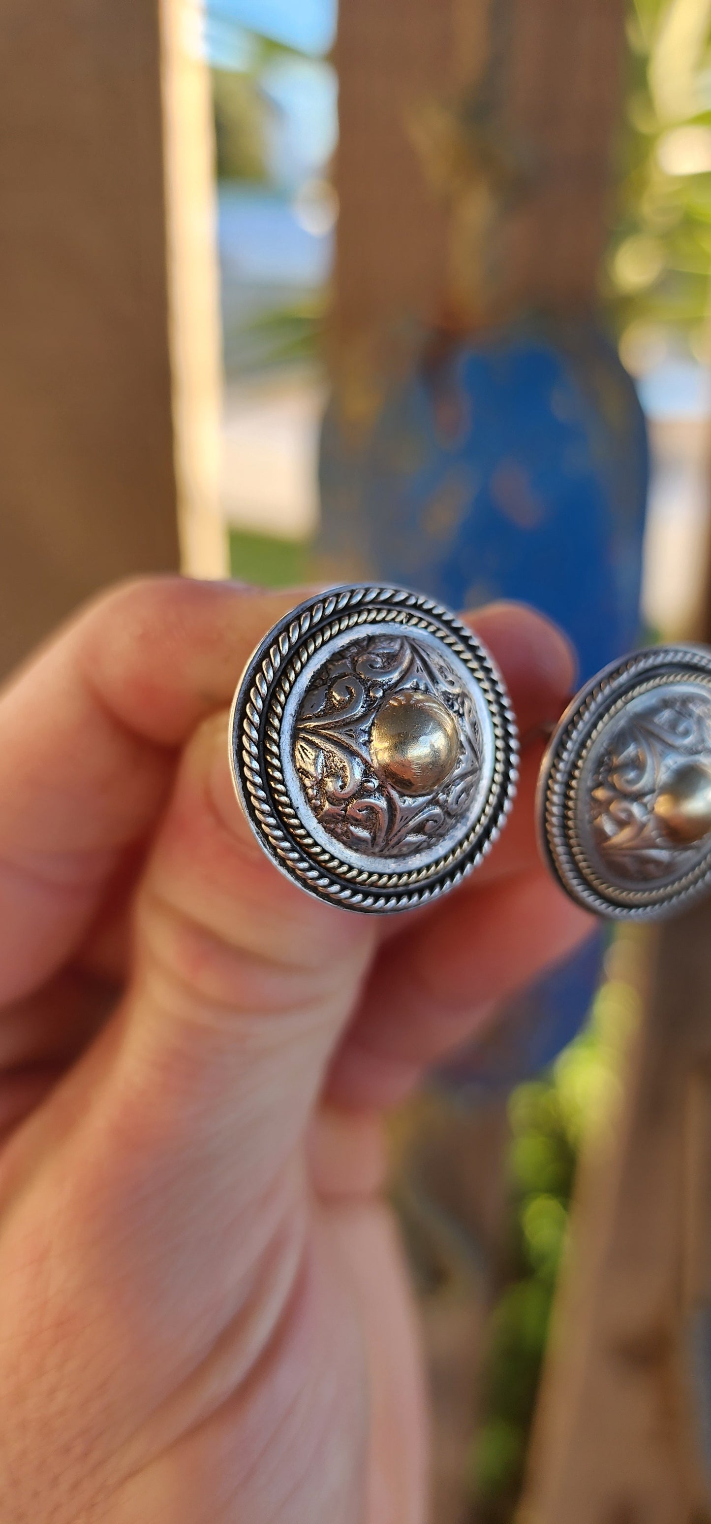 These marvelous and boldly styled earrings are a distinctive early creation by sought-after local jewelry designer Susan Roos. Crafted in solid sterling silver, these large push-in earrings make a powerful statement.