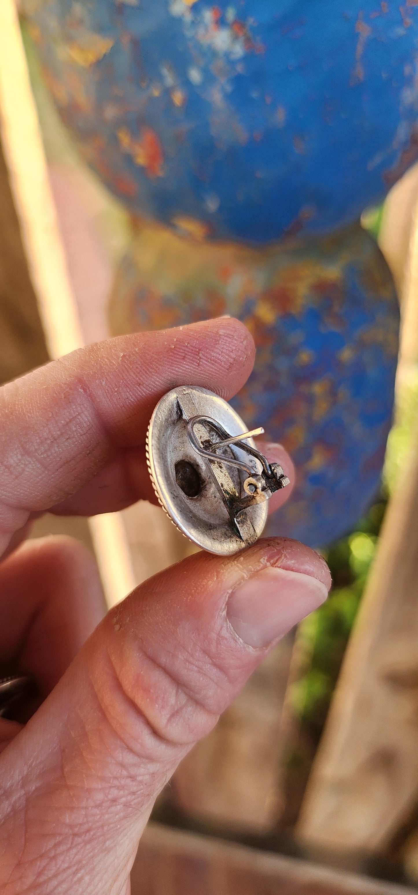 These marvelous and boldly styled earrings are a distinctive early creation by sought-after local jewelry designer Susan Roos. Crafted in solid sterling silver, these large push-in earrings make a powerful statement.