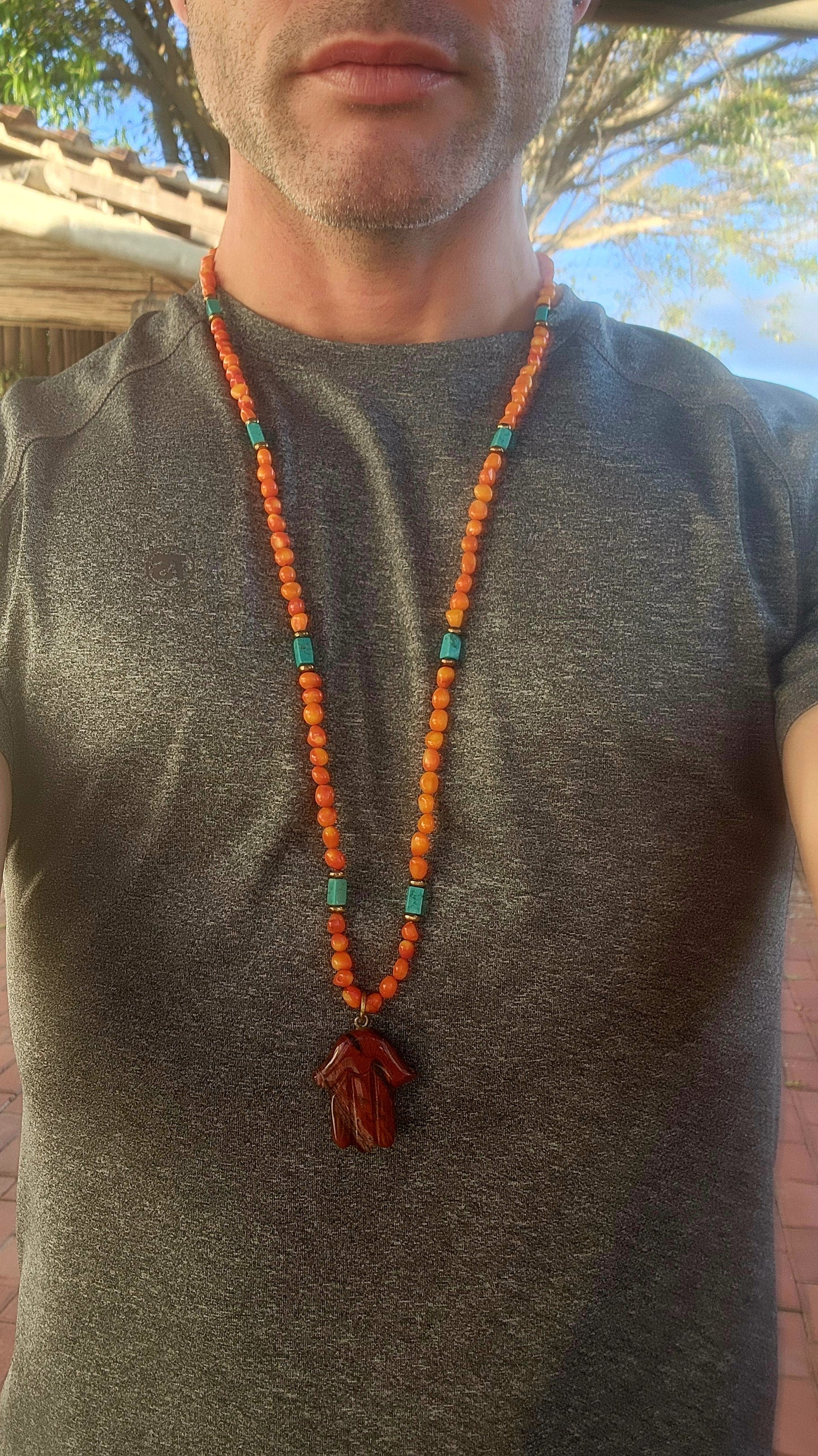 This striking, one-of-a-kind extra-length designer necklace by Beryl Dingemans beautifully fuses organic warmth with a touch of bohemian charm.