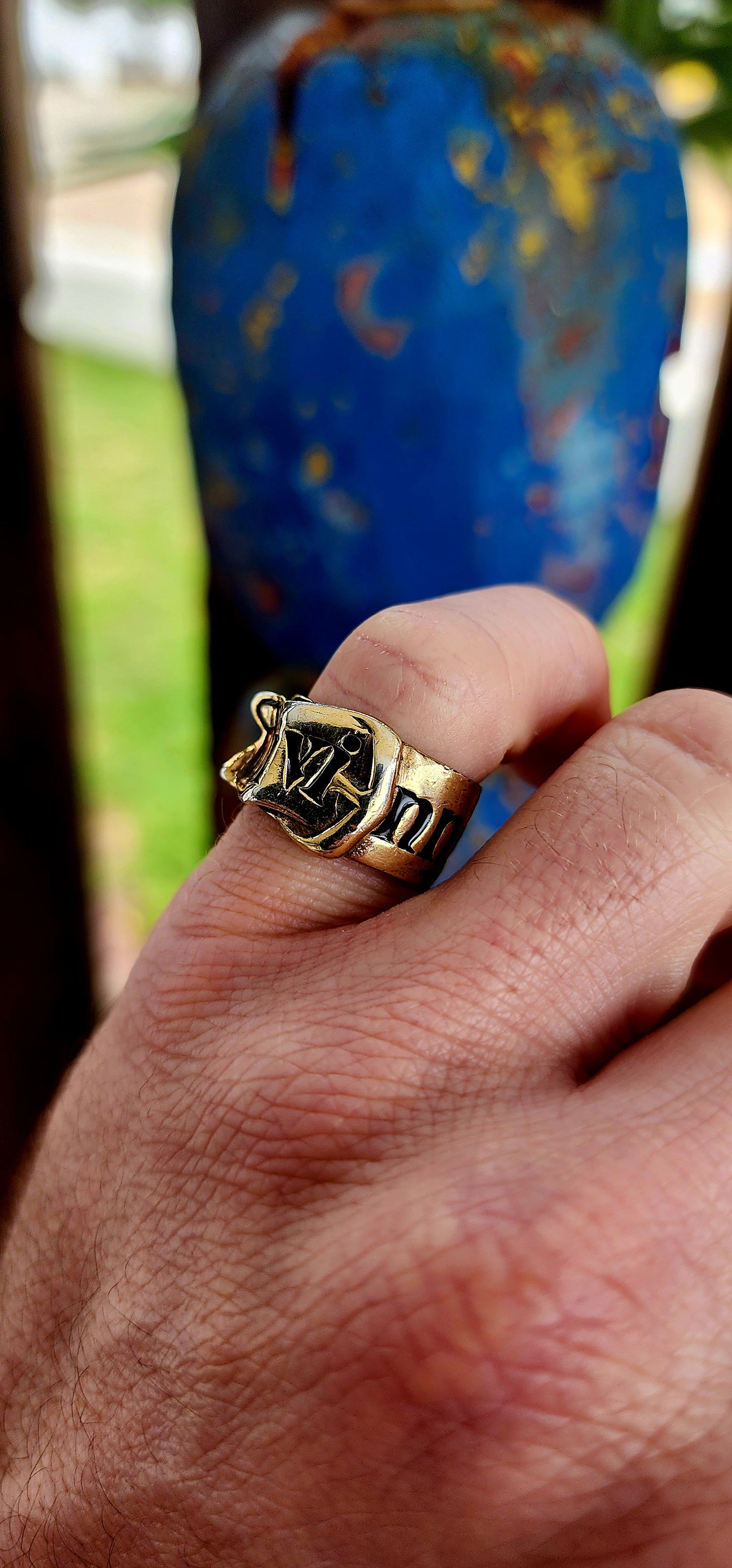 This striking designer ring is a creation of the legendary Vivienne Westwood, crafted in sterling silver with a lavish layer of gold plating. Evoking one of Westwood’s most beloved house codes, the ring takes the form of a sculpted belt with a buckle.