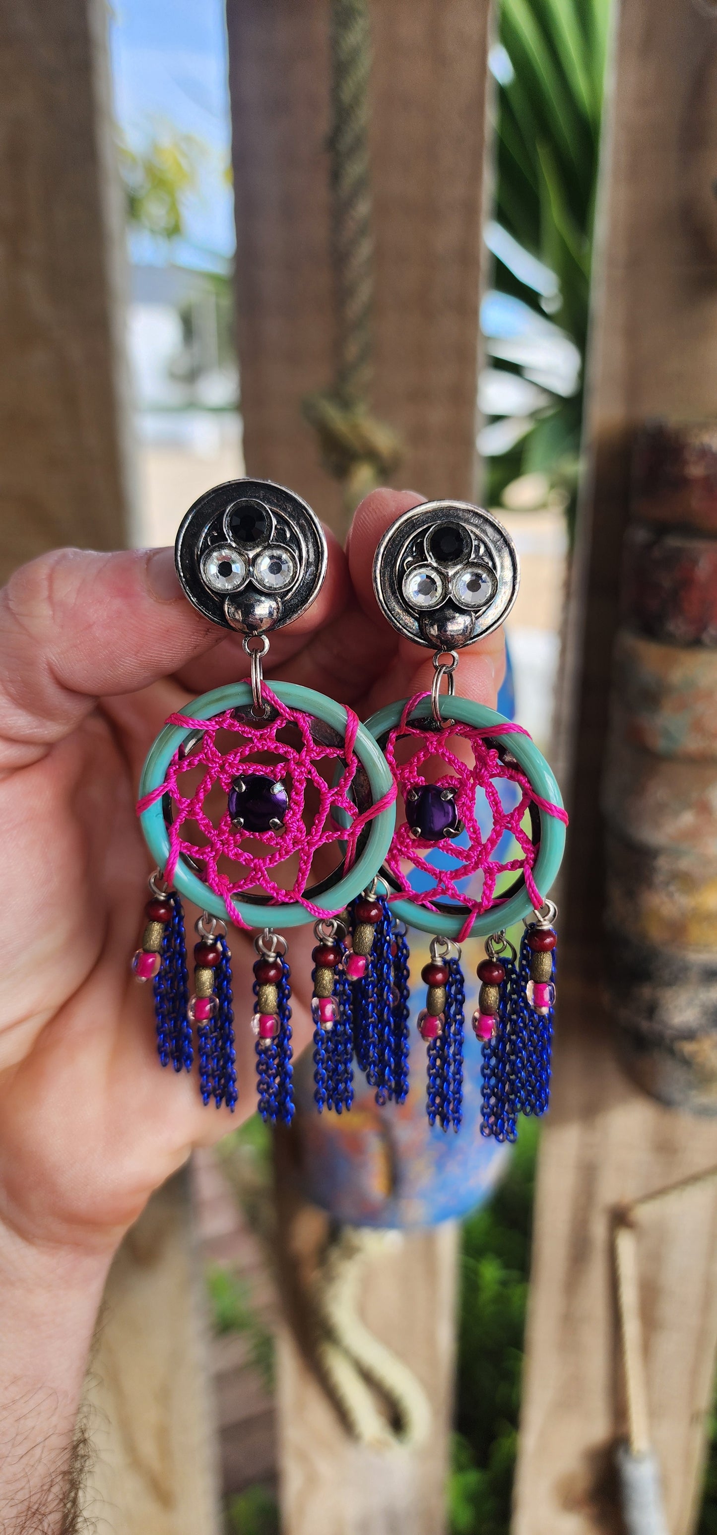 Spectacular pair of costume statement earrings by Reminiscence, the renowned French fashion house known for blending haute couture artistry with exotic, boho-luxe flair.
