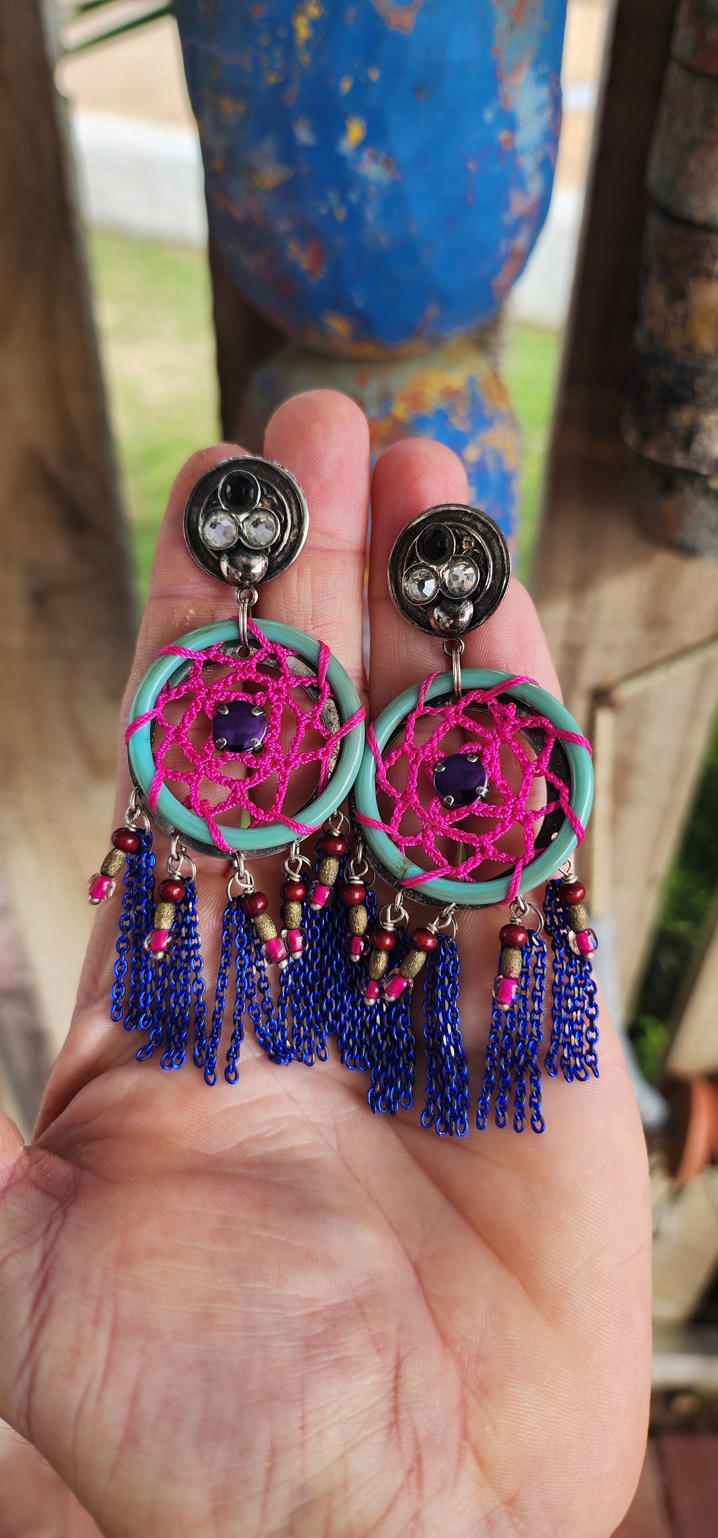 Spectacular pair of costume statement earrings by Reminiscence, the renowned French fashion house known for blending haute couture artistry with exotic, boho-luxe flair.