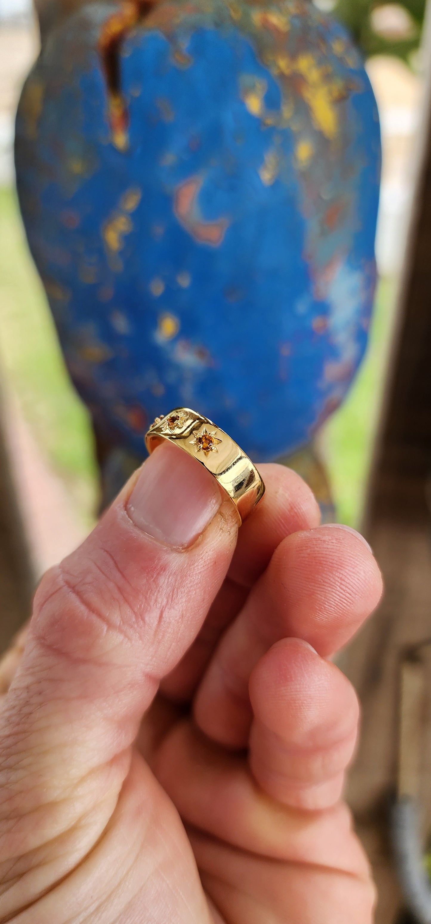 A Golden Gypsy Ring with Citrine Stardust.
Bold, luminous, and radiating warmth, this unisex gypsy ring is crafted from solid sterling silver and richly plated with glowing 18ct yellow gold.