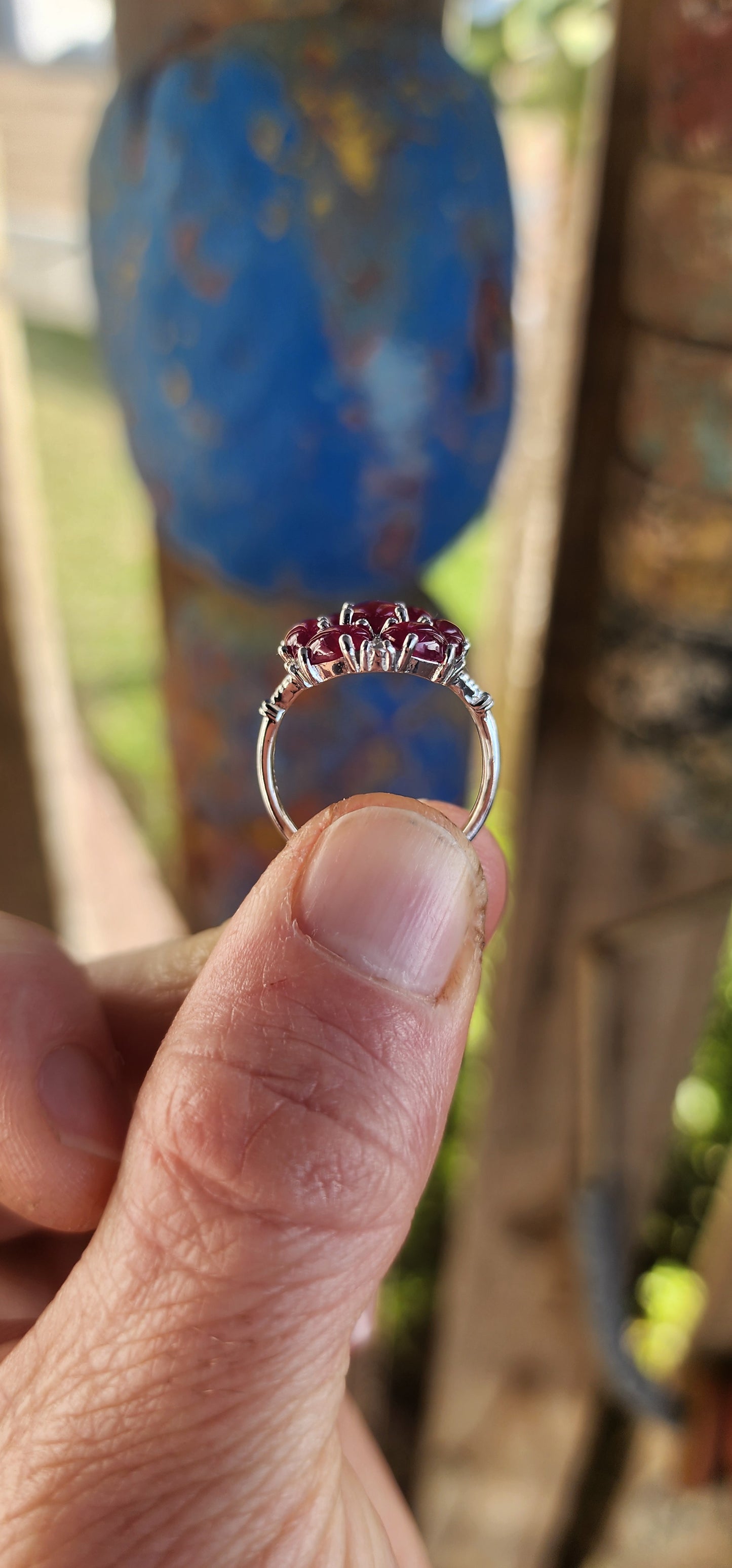 Crimson Constellation" Statement Ring.
Drenched in vivid glamour, this breathtaking sterling silver cluster ring is a celebration of deep red beauty.