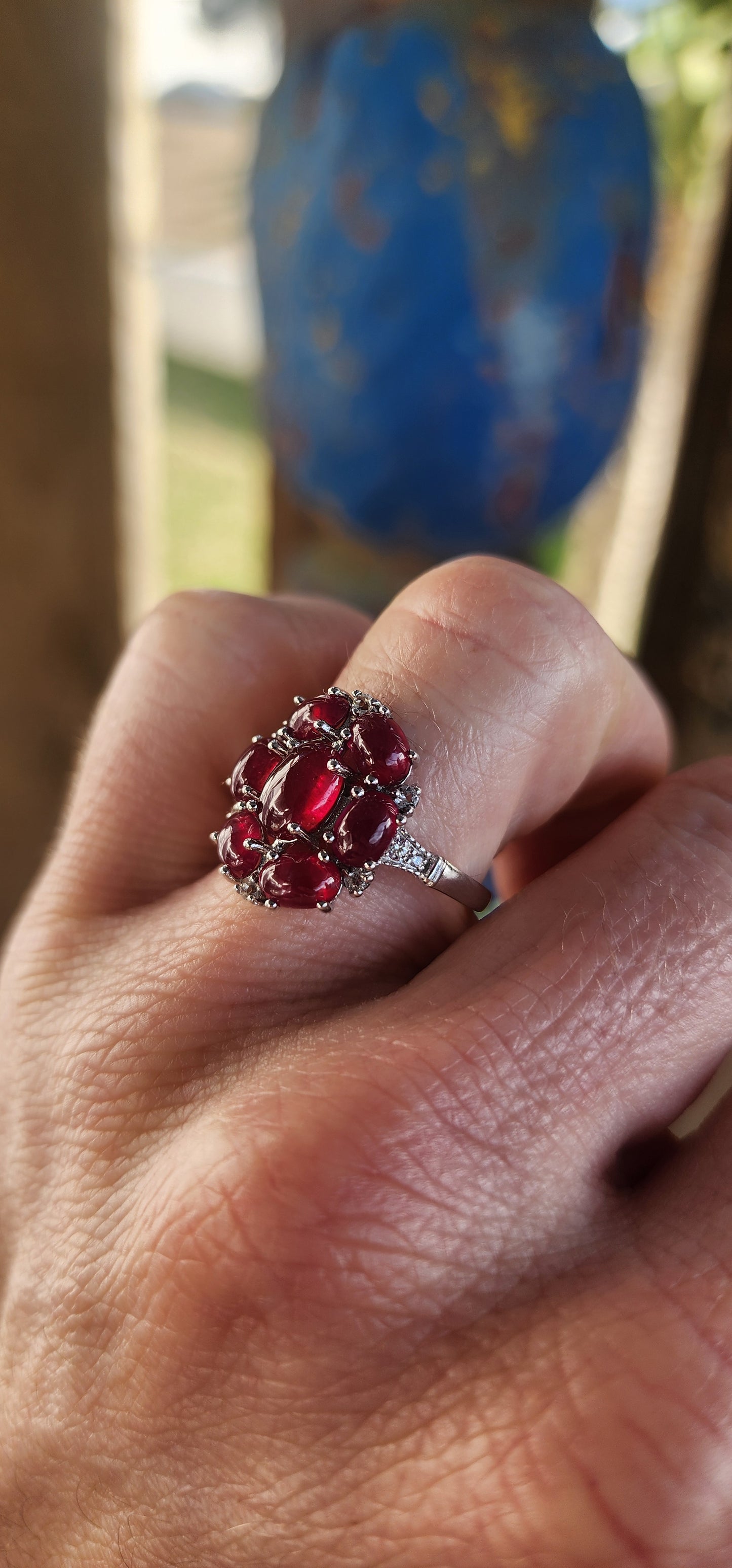 Crimson Constellation" Statement Ring.
Drenched in vivid glamour, this breathtaking sterling silver cluster ring is a celebration of deep red beauty.