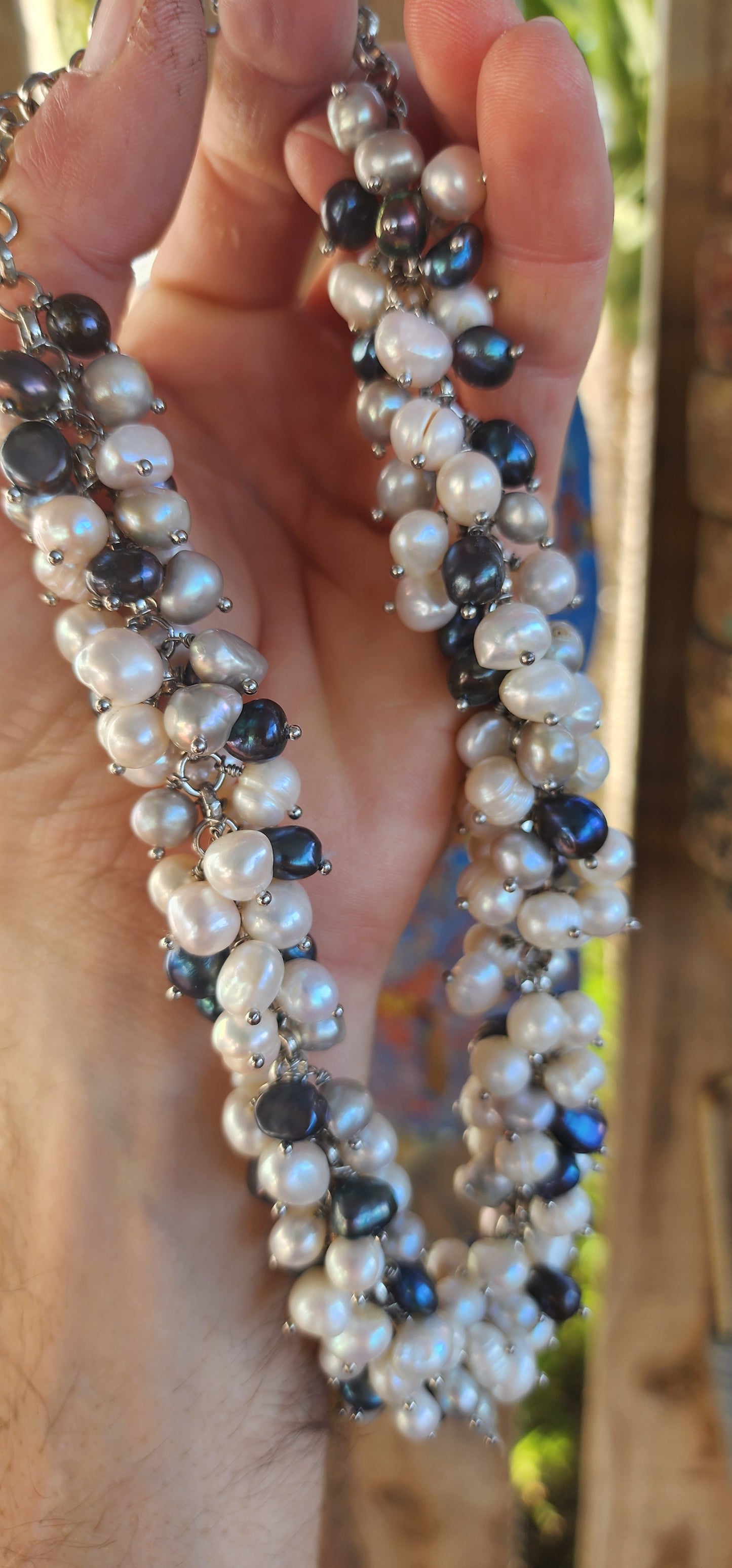 A bold twist on classic elegance — this magnificent statement necklace bursts with organic charm and lush texture!