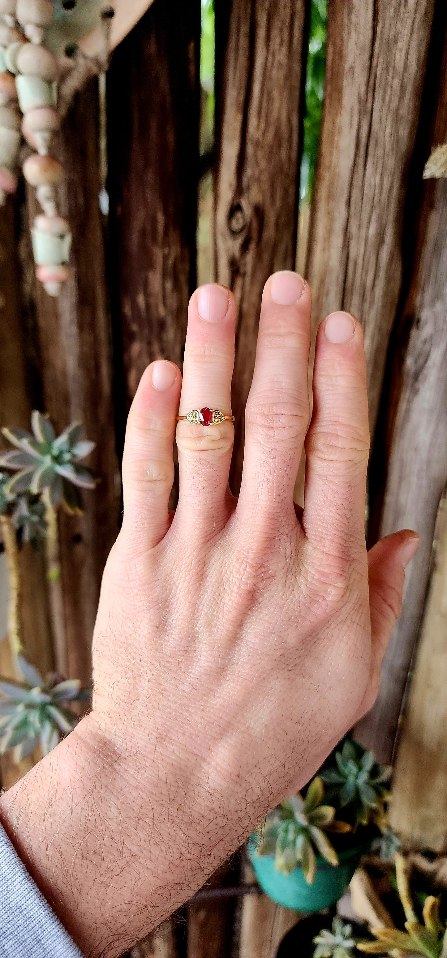 This enchanting trilogy-style ring is a delightful dance of elegance.
Crafted from sterling silver and generously plated with 18ct yellow gold.
