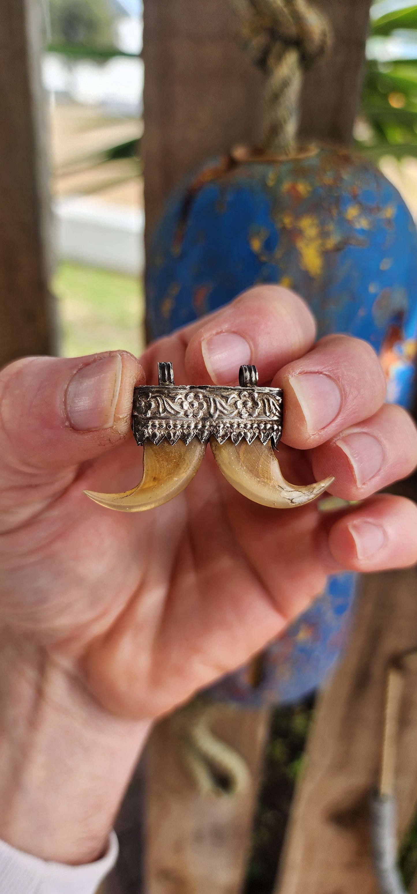 This pendant is a striking example of a traditional Indian double tiger claw talisman — a form deeply rooted in the country’s cultural heritage and long associated with strength, protection, and prestige.