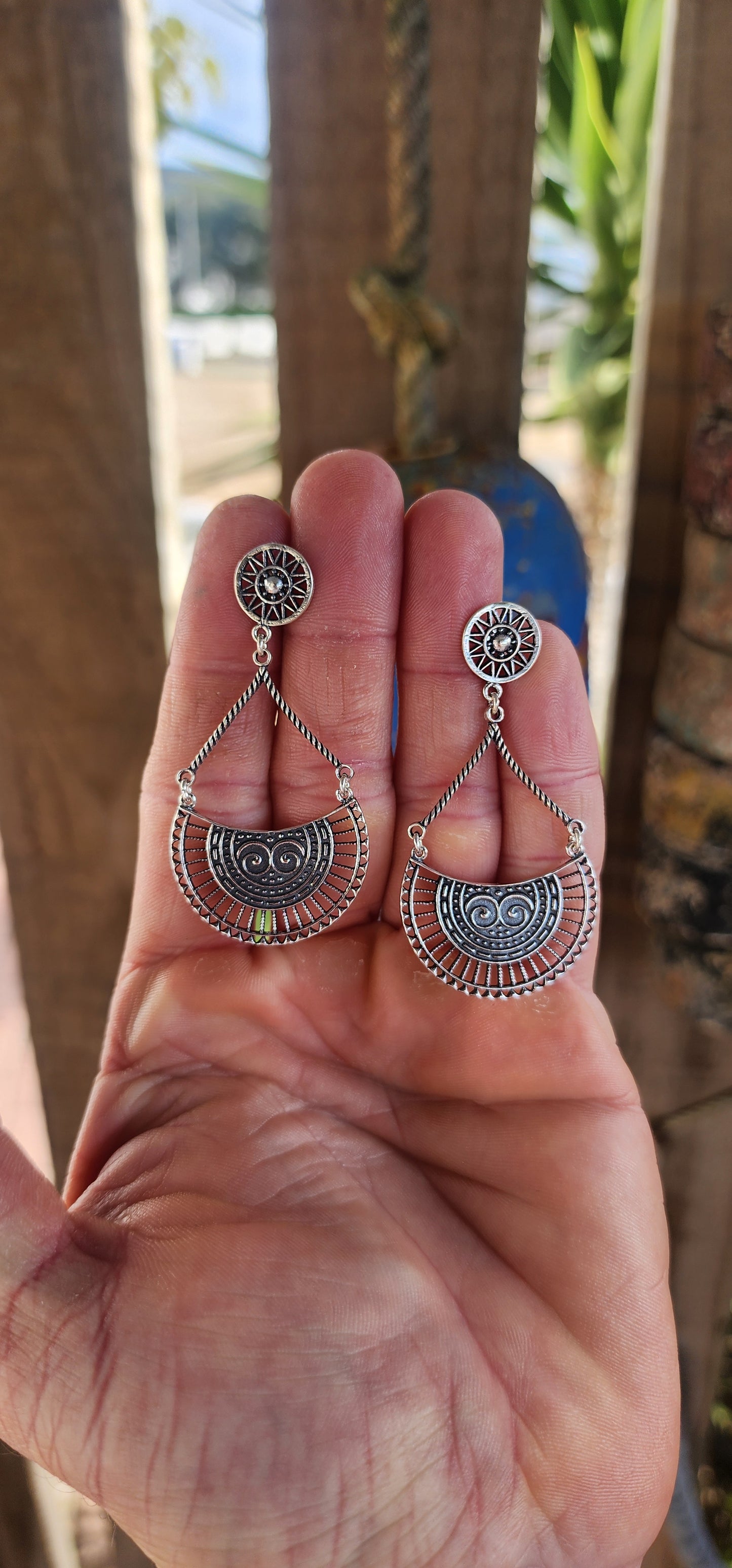 These striking earrings are crafted in solid sterling silver, showcasing a bold bohemian–tribal aesthetic that’s both artistic and wearable.