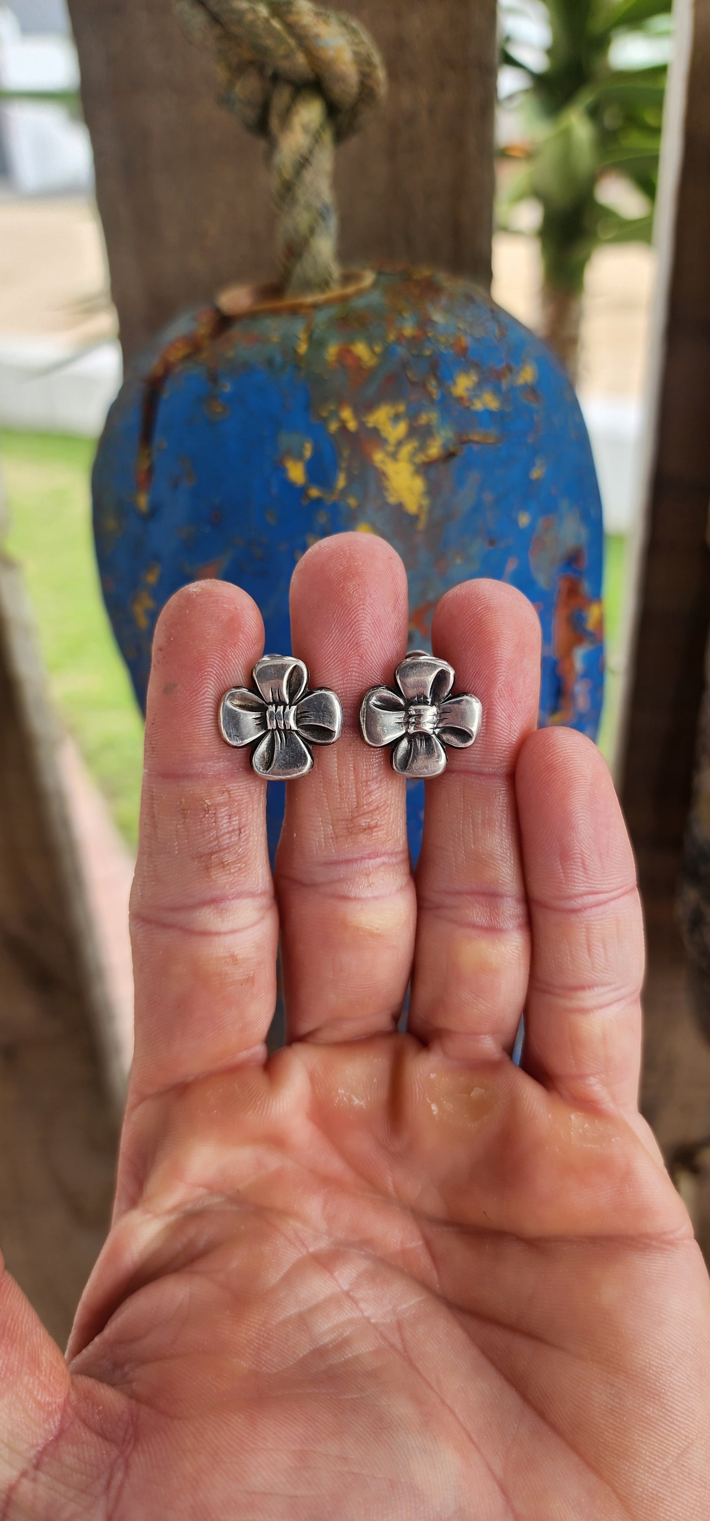 This vintage pair of clip-on earrings, crafted circa 1957, is a charming showcase of Scandinavian design elegance.