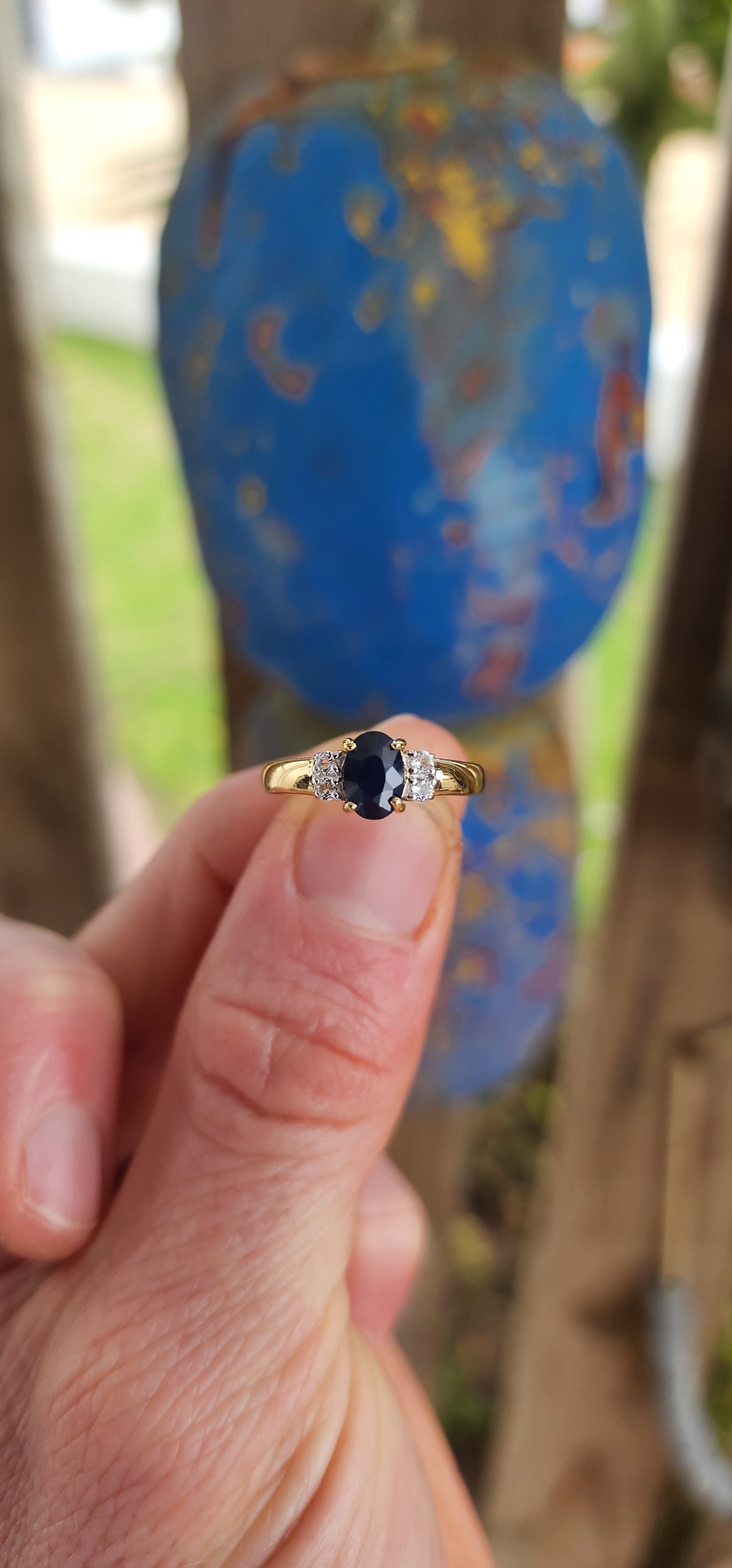 Beautiful trilogy-style ring crafted in sterling silver with 18ct yellow gold plating for a warm, glowing finish.