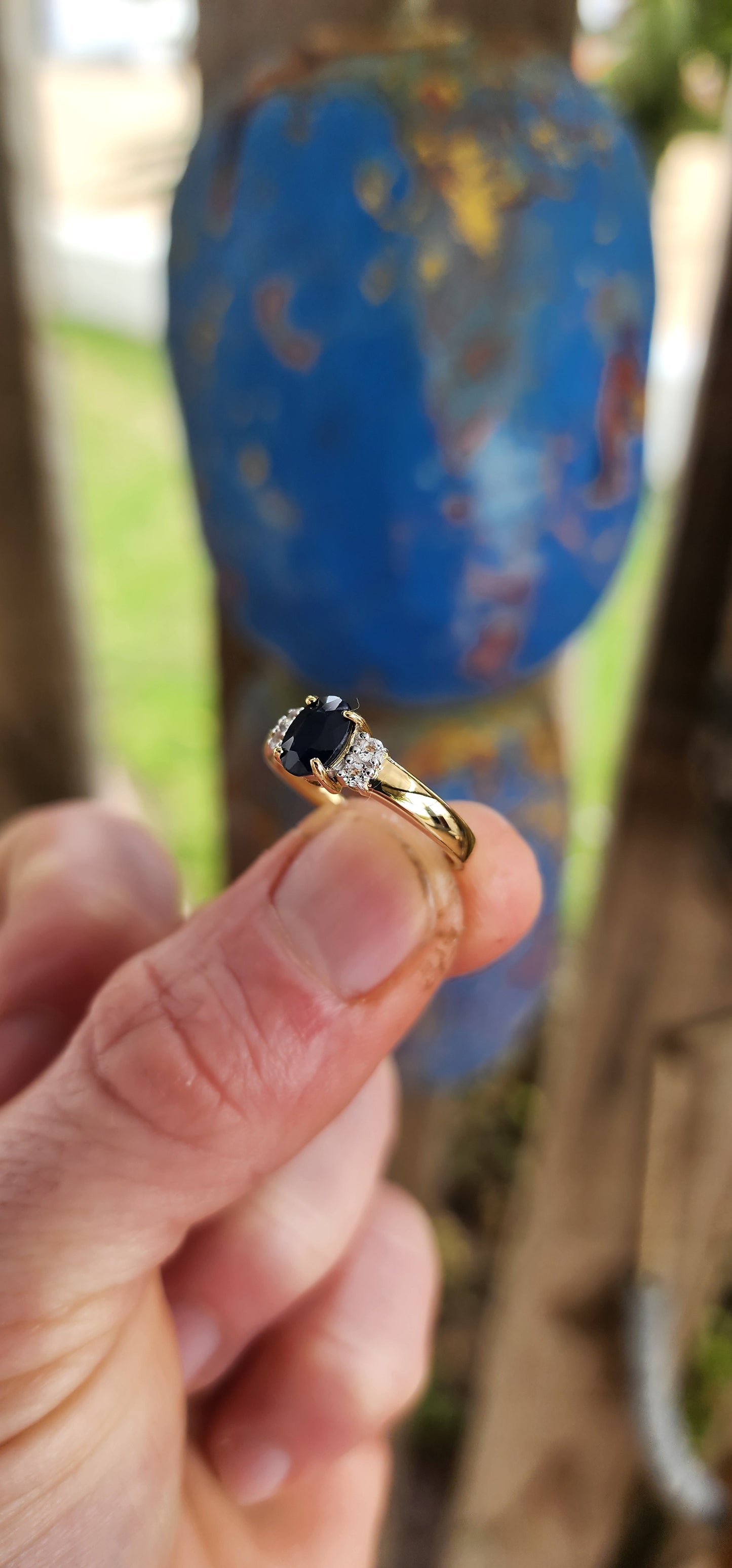 Beautiful trilogy-style ring crafted in sterling silver with 18ct yellow gold plating for a warm, glowing finish.
