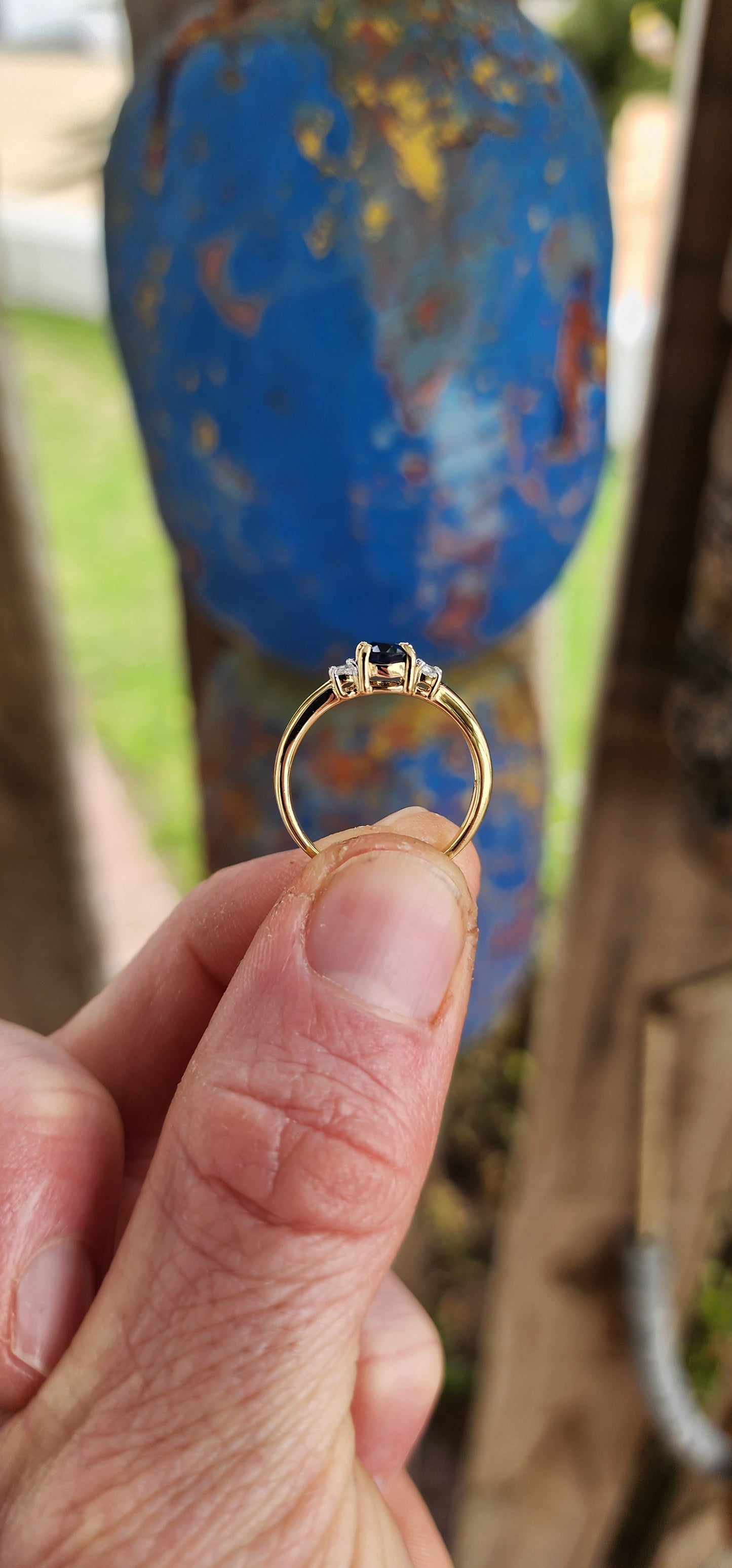 Beautiful trilogy-style ring crafted in sterling silver with 18ct yellow gold plating for a warm, glowing finish.