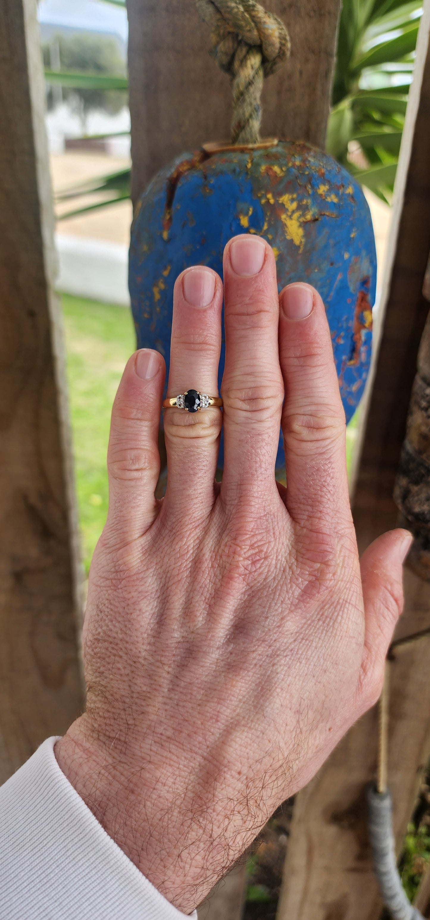 Beautiful trilogy-style ring crafted in sterling silver with 18ct yellow gold plating for a warm, glowing finish.