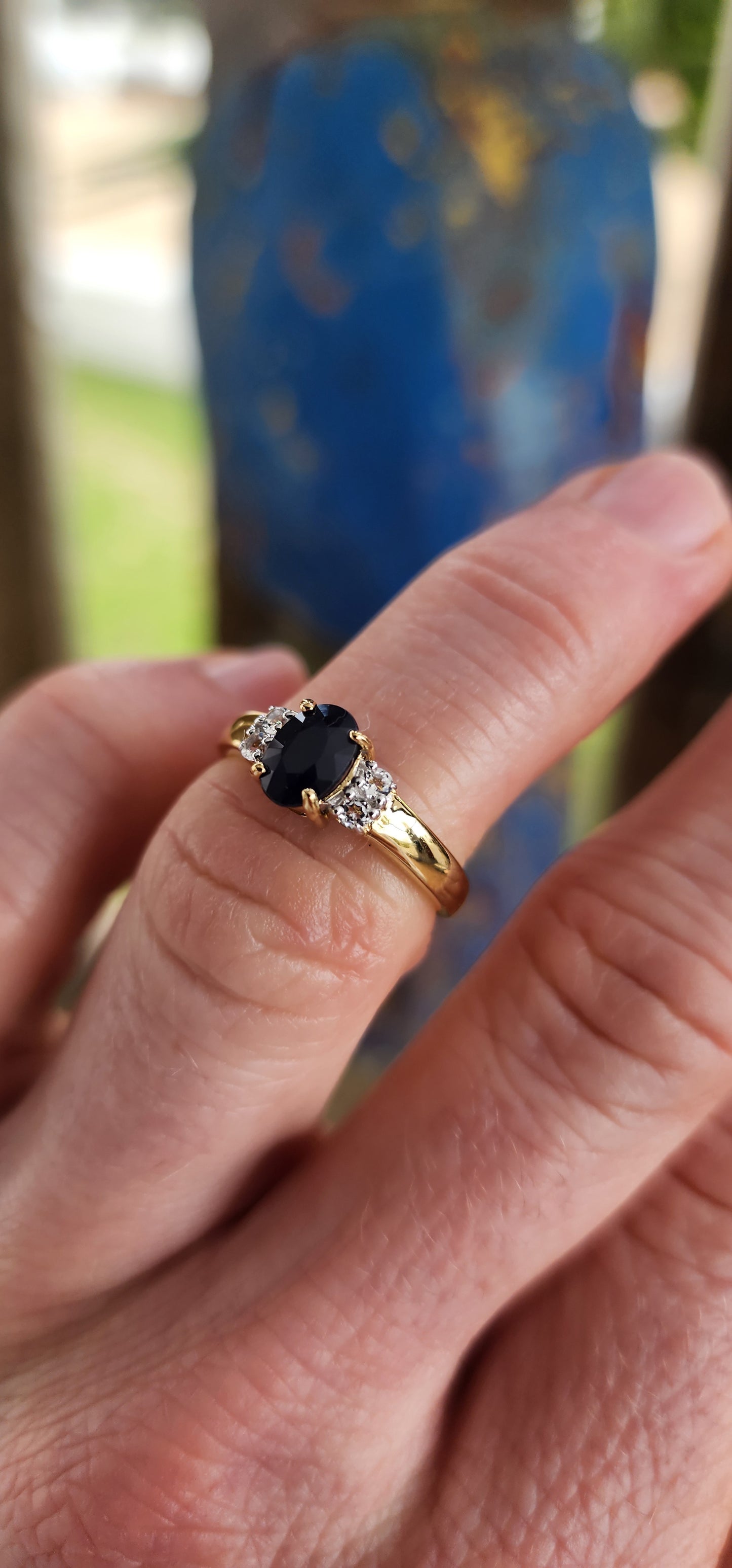 Beautiful trilogy-style ring crafted in sterling silver with 18ct yellow gold plating for a warm, glowing finish.