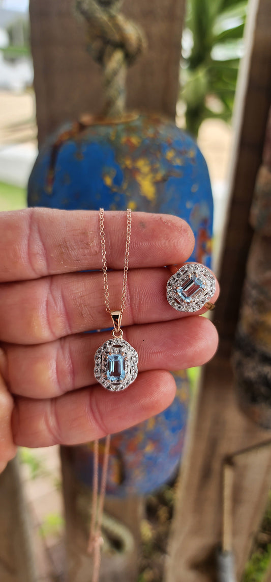 Magical matching set featuring both a halo-style ring and a coordinating pendant on an adjustable chain.