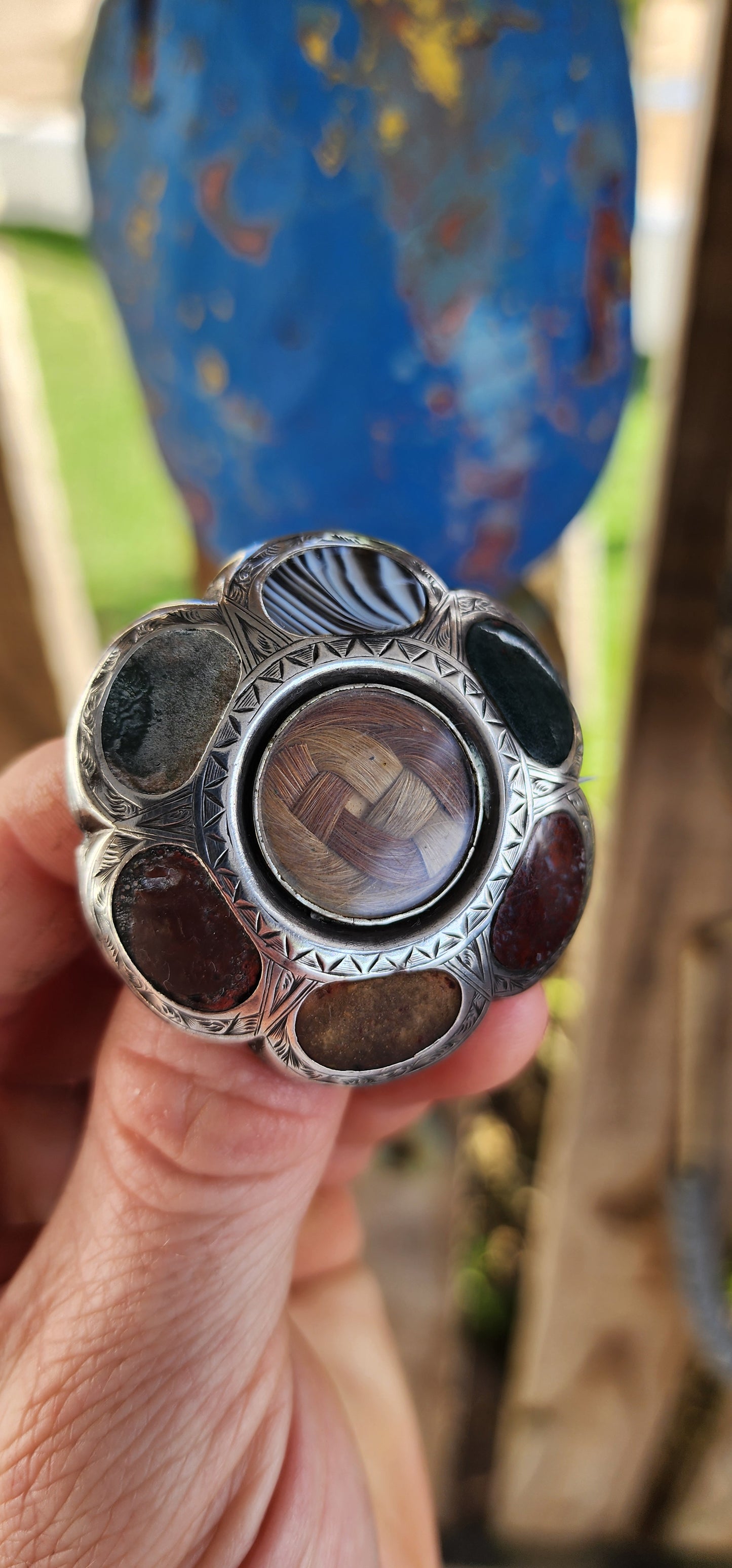 A truly exceptional find, this generous-sized Victorian-era sterling silver Scottish mourning brooch/pendant carries with it layers of history, symbolism, and sentiment.