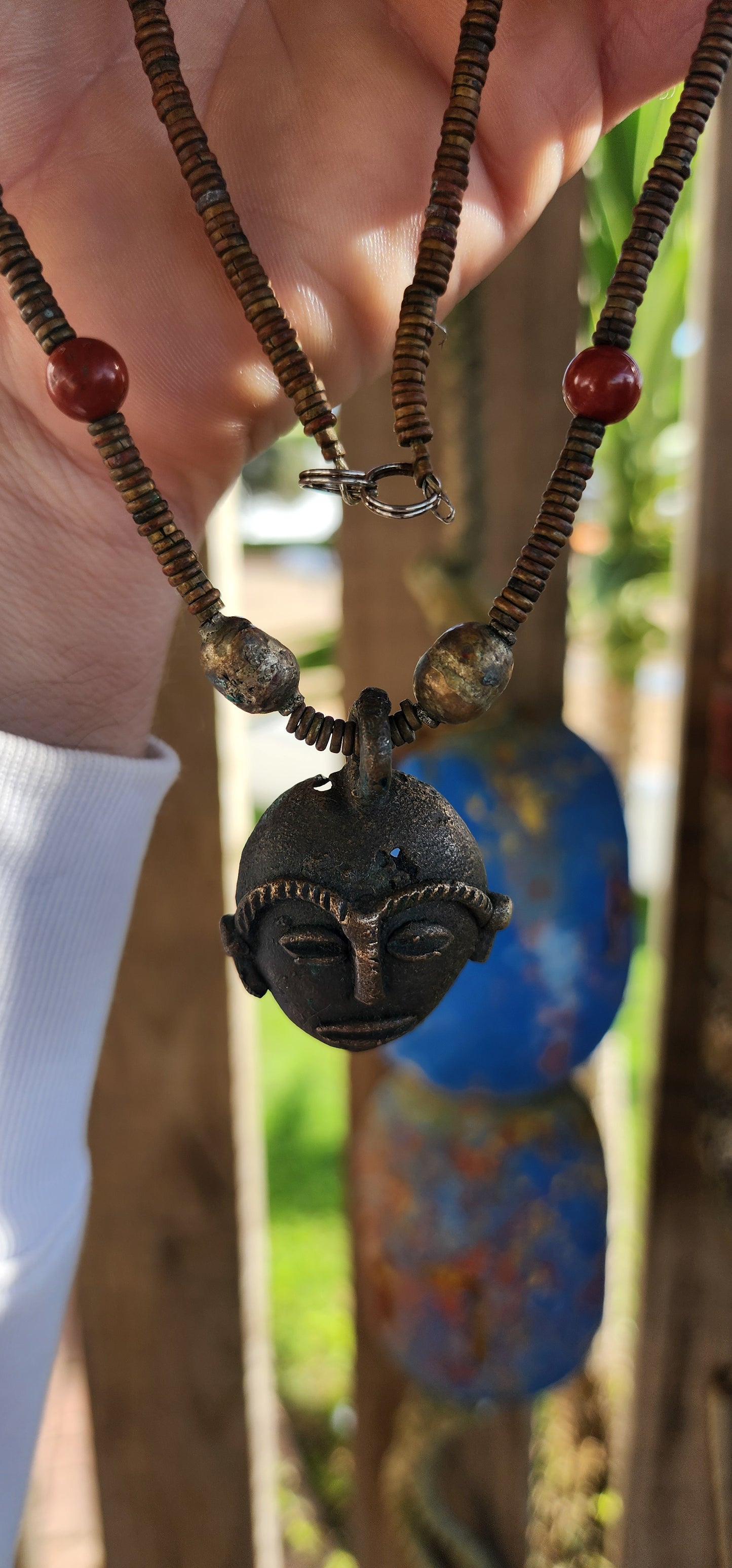 This striking vintage ethnic statement necklace hails from Ghana West Africa, where jewelry and adornment are deeply tied to cultural identity and symbolism.