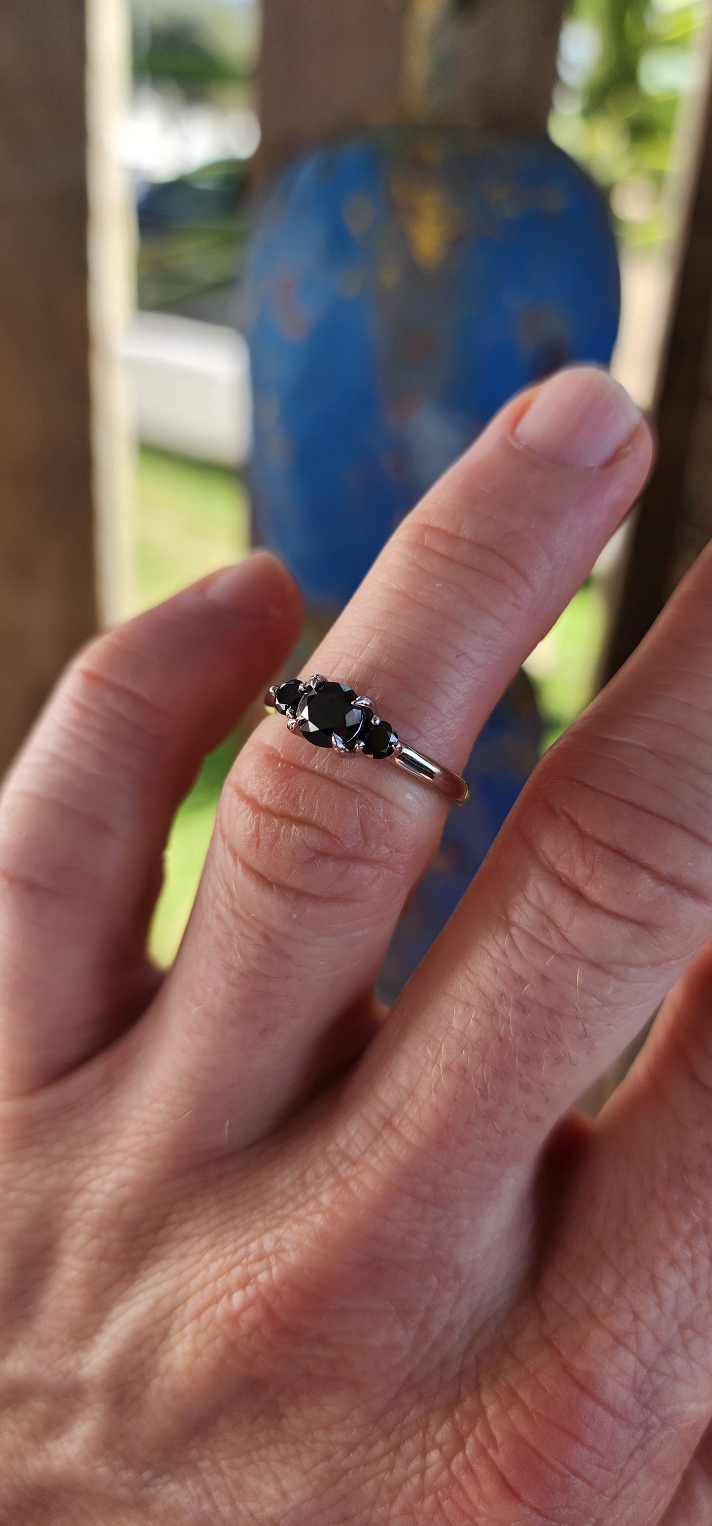 Midnight Trinity
A ring that whispers secrets of the night sky.Crafted in sterling silver and rhodium-plated to hold its forever-sparkle.