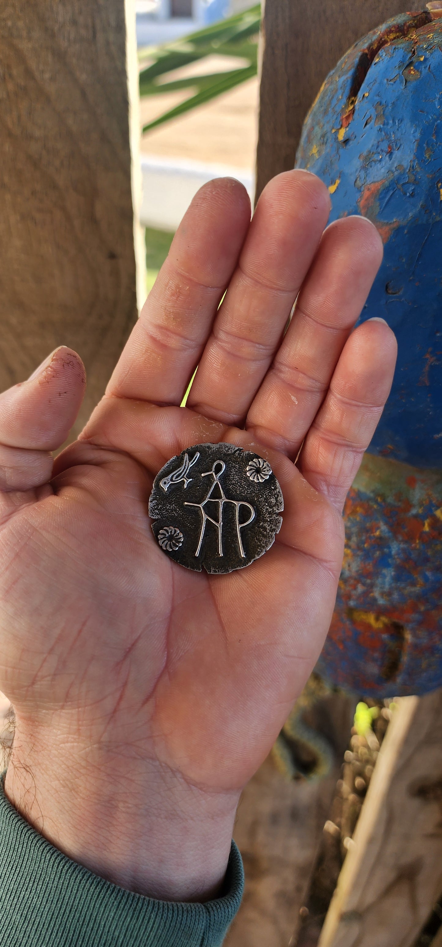 This remarkable and unusual brooch is crafted in solid 800 silver, designed with a strikingly modernist touch yet inspired by the deep past.