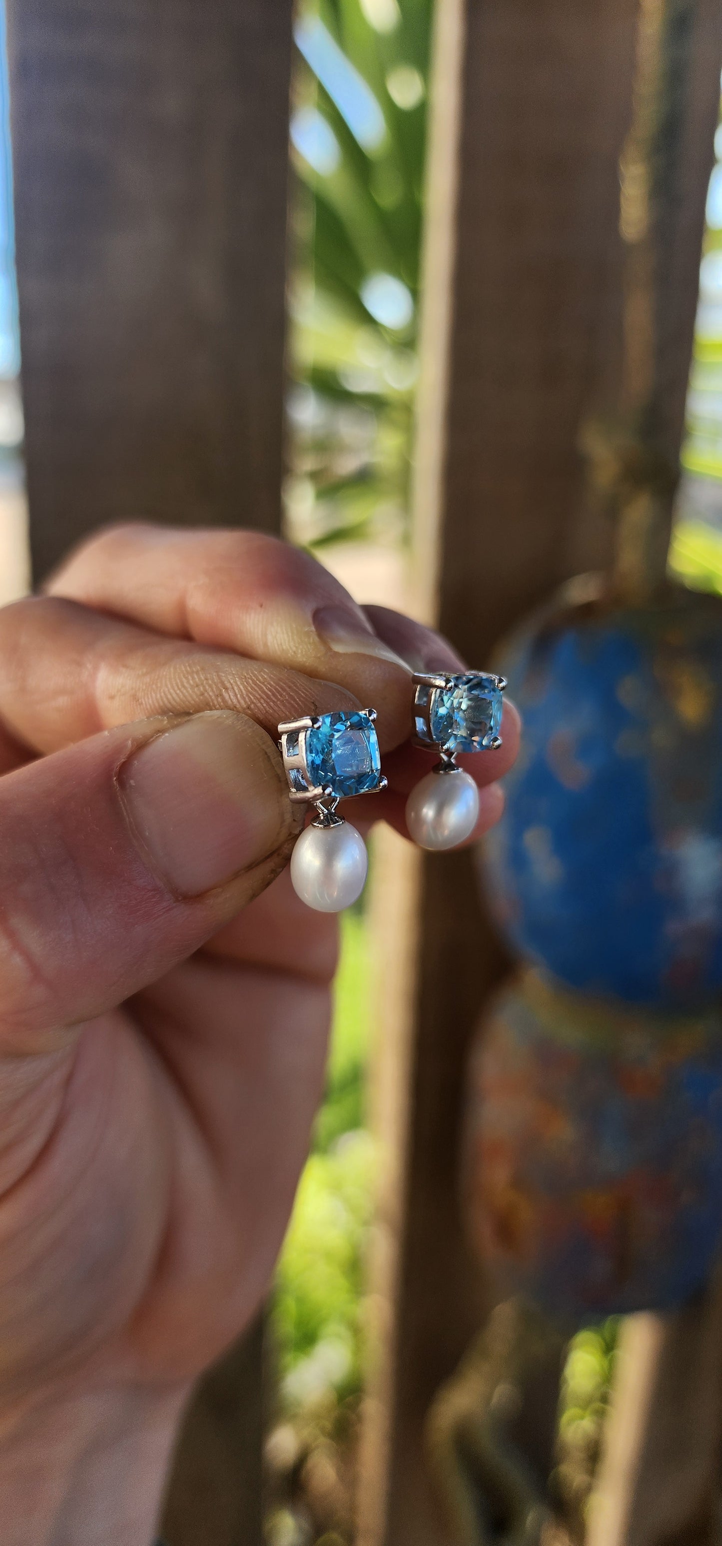 Elegant Sterling Silver Push-In Drop Earrings with Cushion-Cut Sky Blue Topaz and Cultured Pearl Drops.